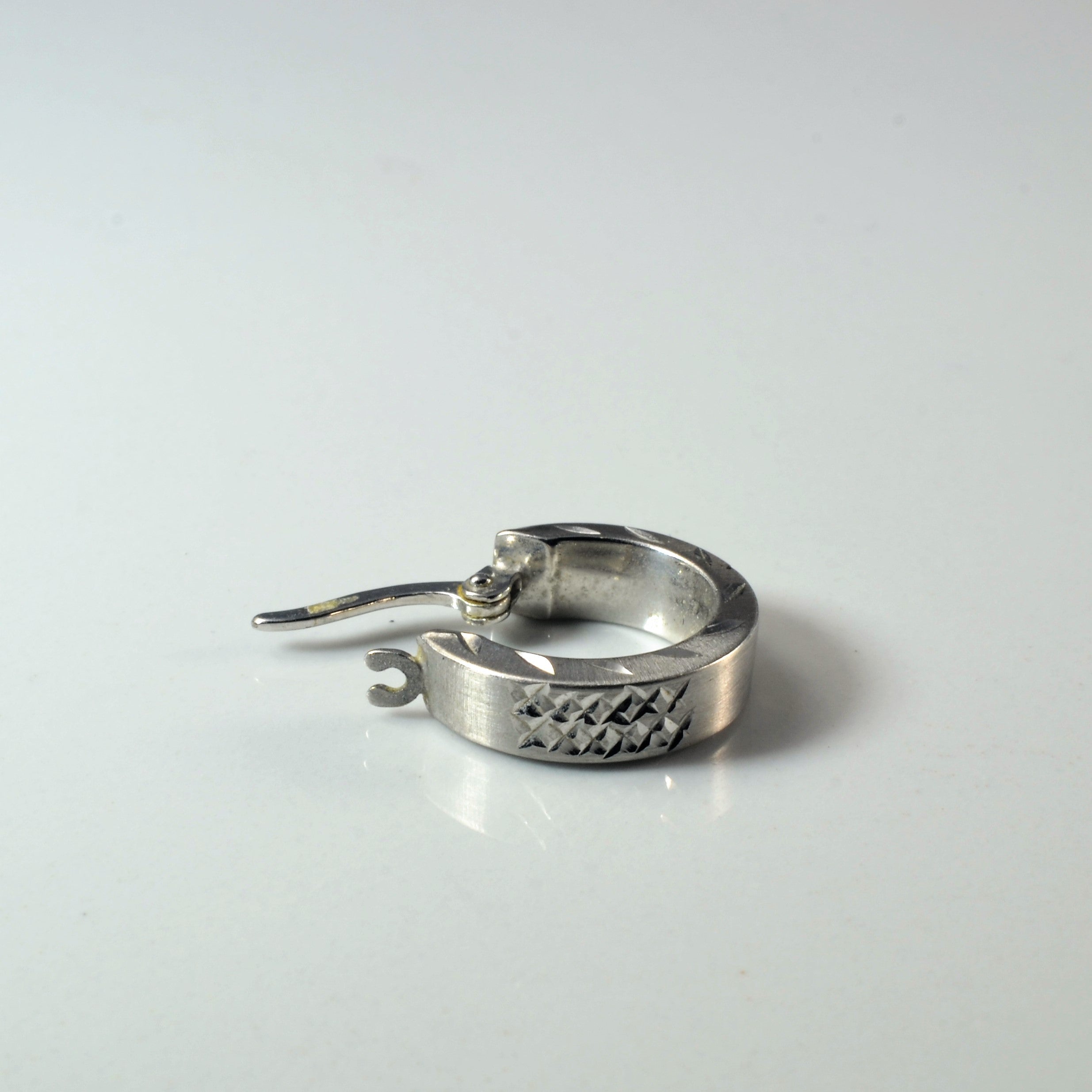White Gold Textured Huggie Earrings |