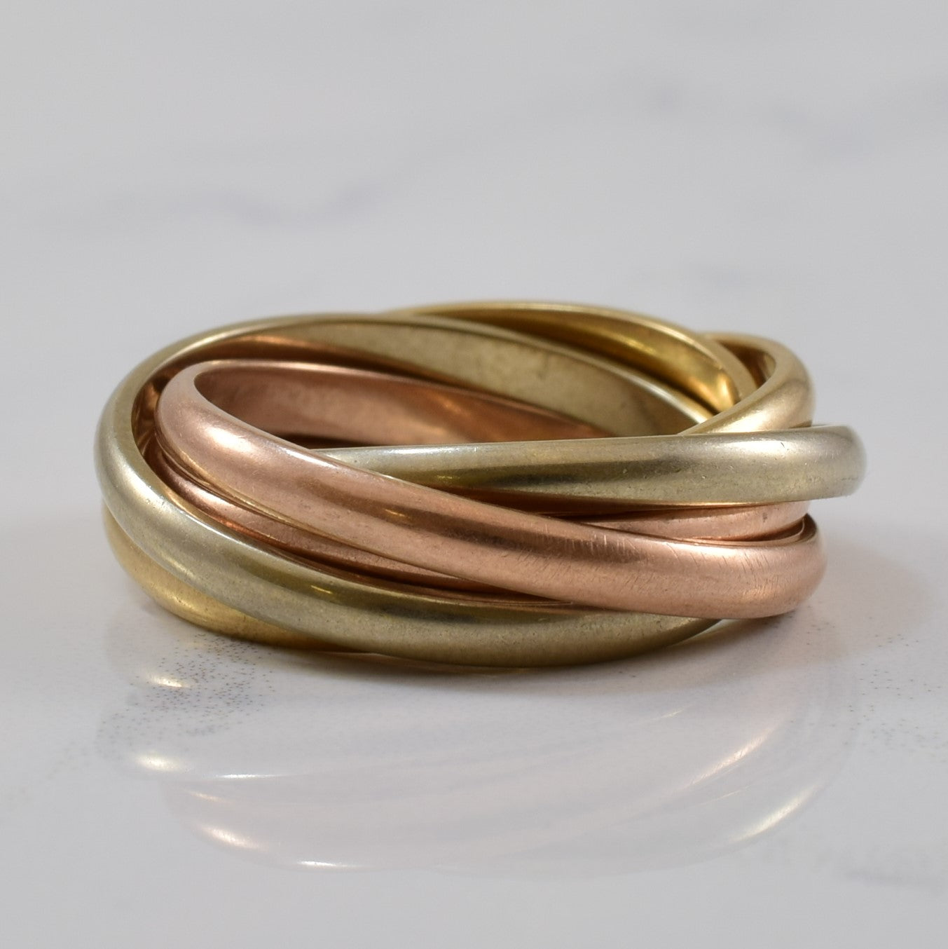 Tri gold store rolling ring