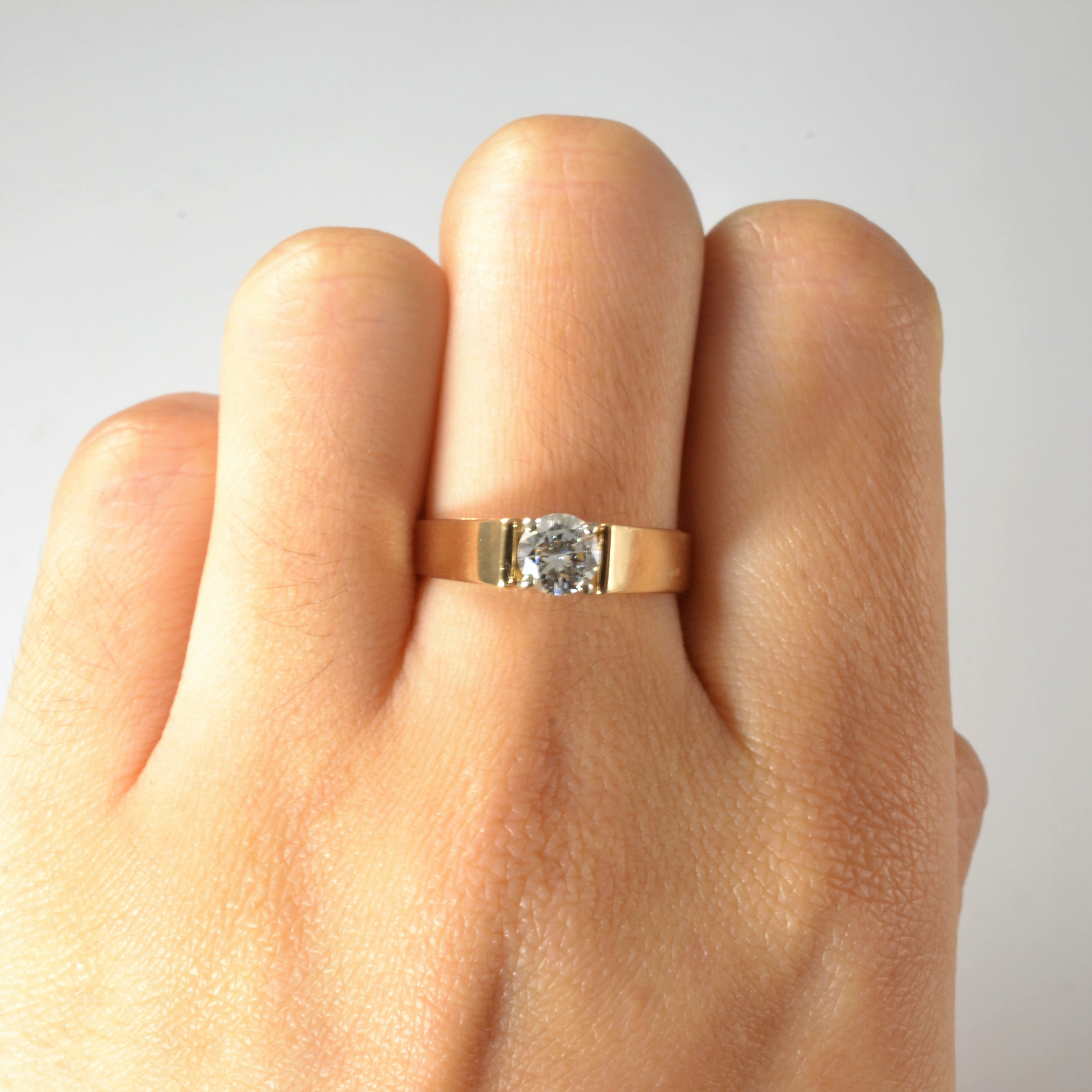 Vintage engagement ring with wide cathedral solitaire diamond,