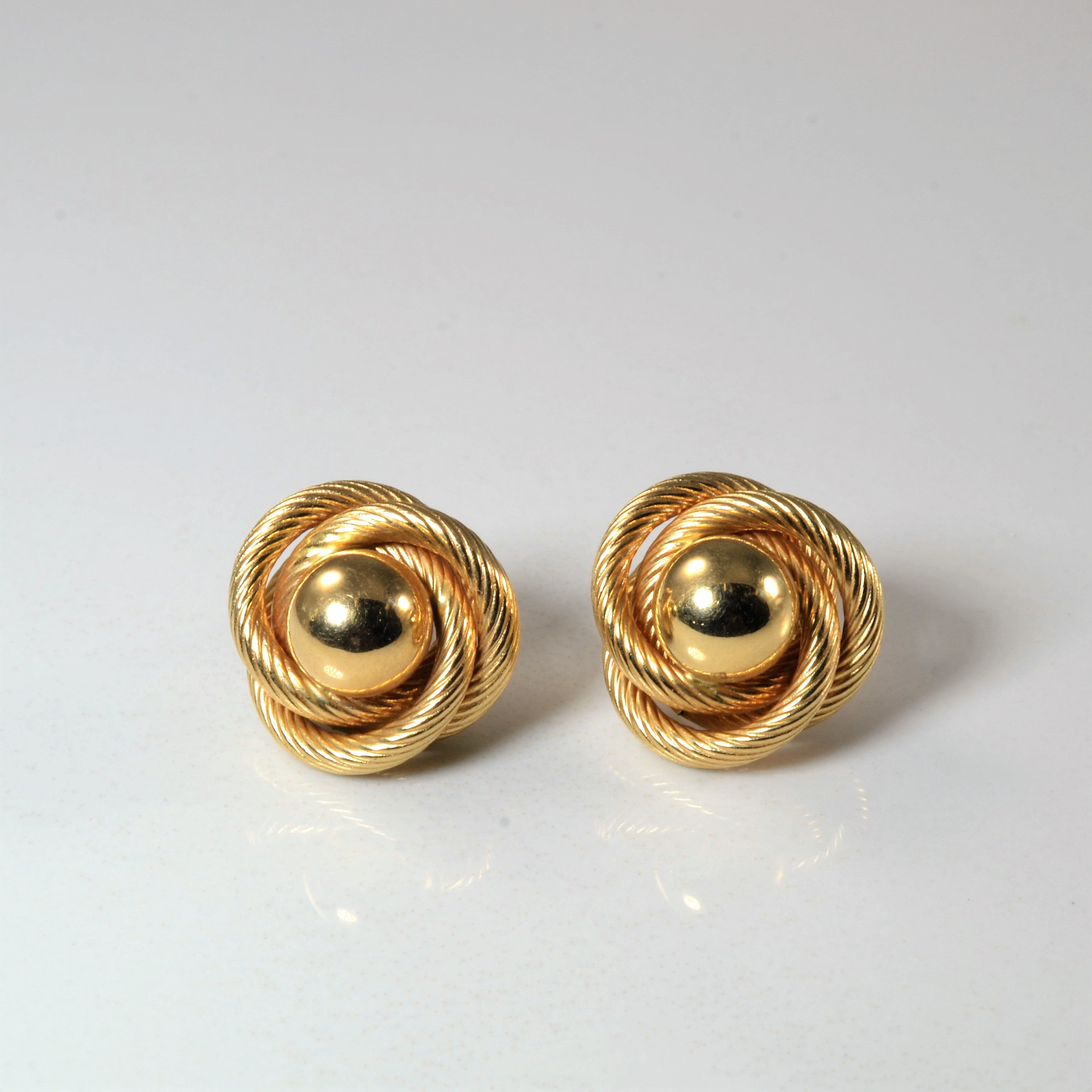 Gold Swirl Stud Earrings |