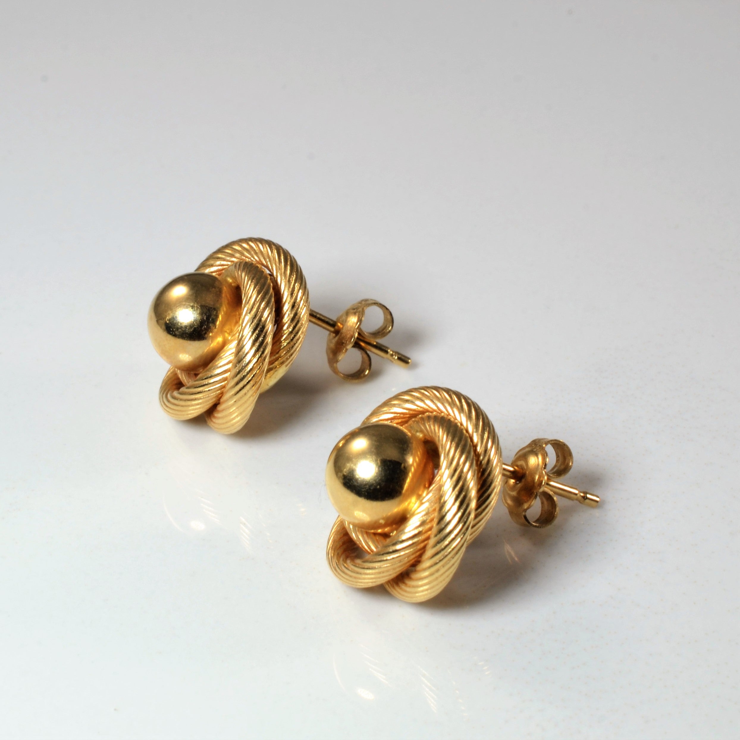 Gold Swirl Stud Earrings |