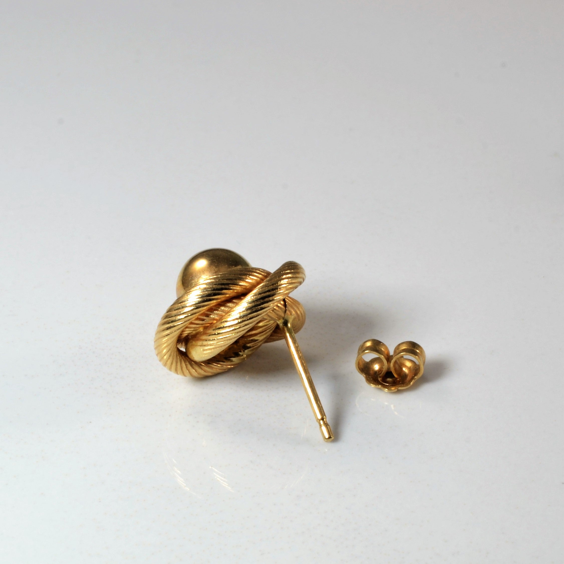 Gold Swirl Stud Earrings |