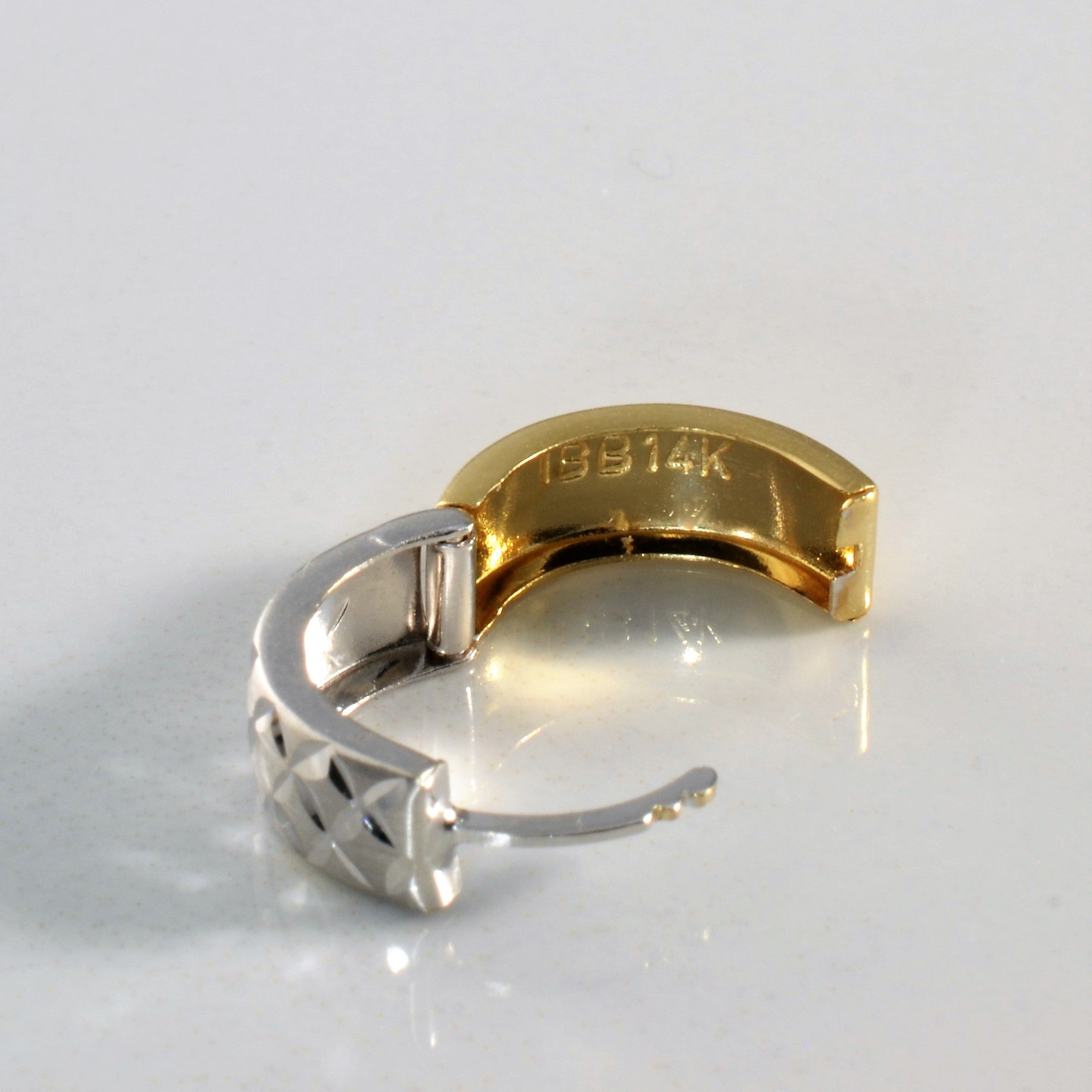 Two Tone Gold Huggie Earrings |