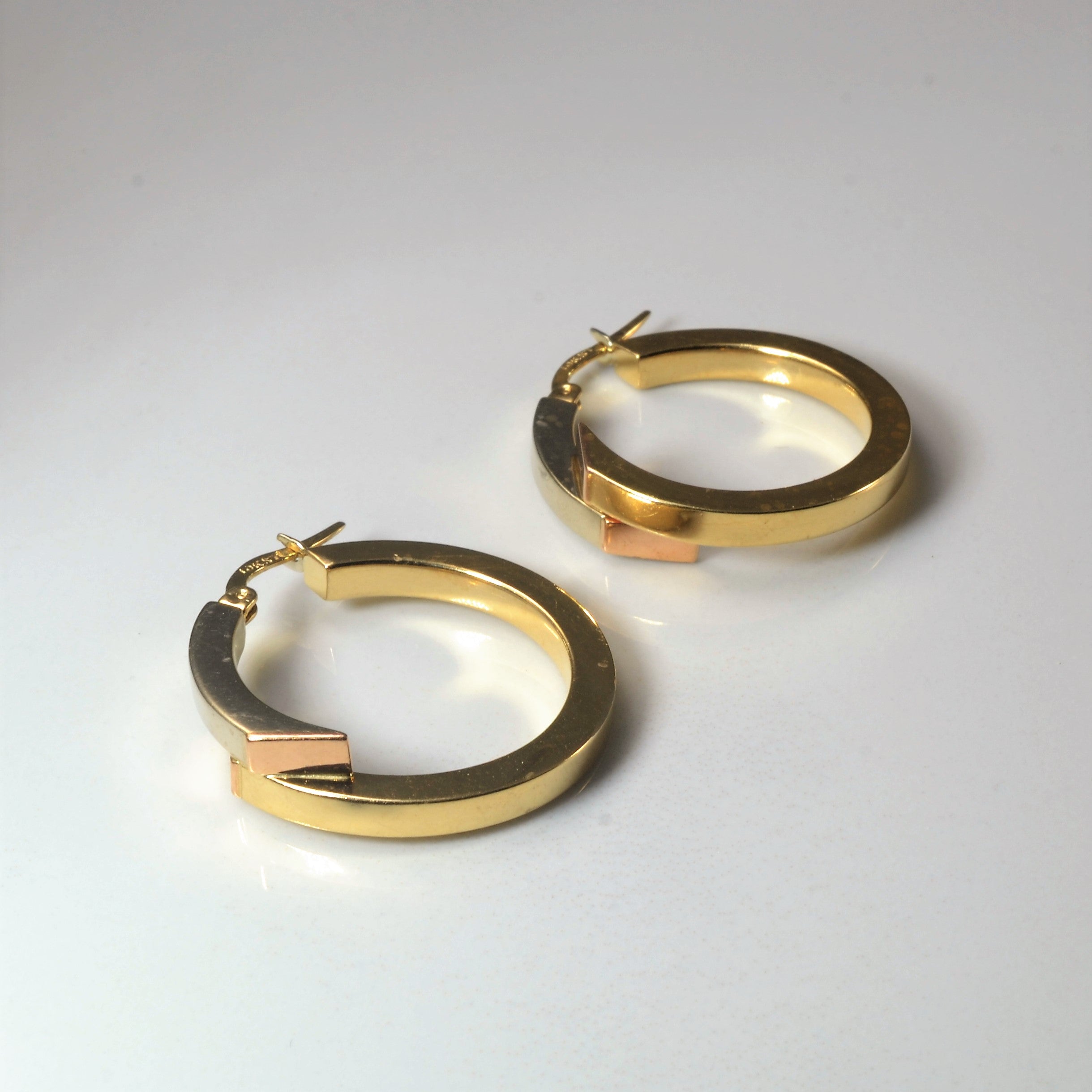 Two Tone Bypass Hoop Earrings |