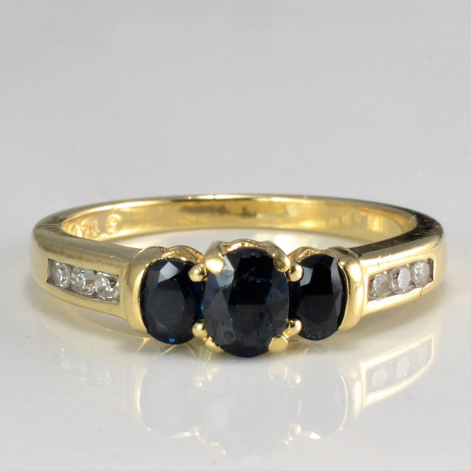Three Stone Sapphire & Diamond Ring | 0.68ctw, 0.10 ctw | SZ 7.25