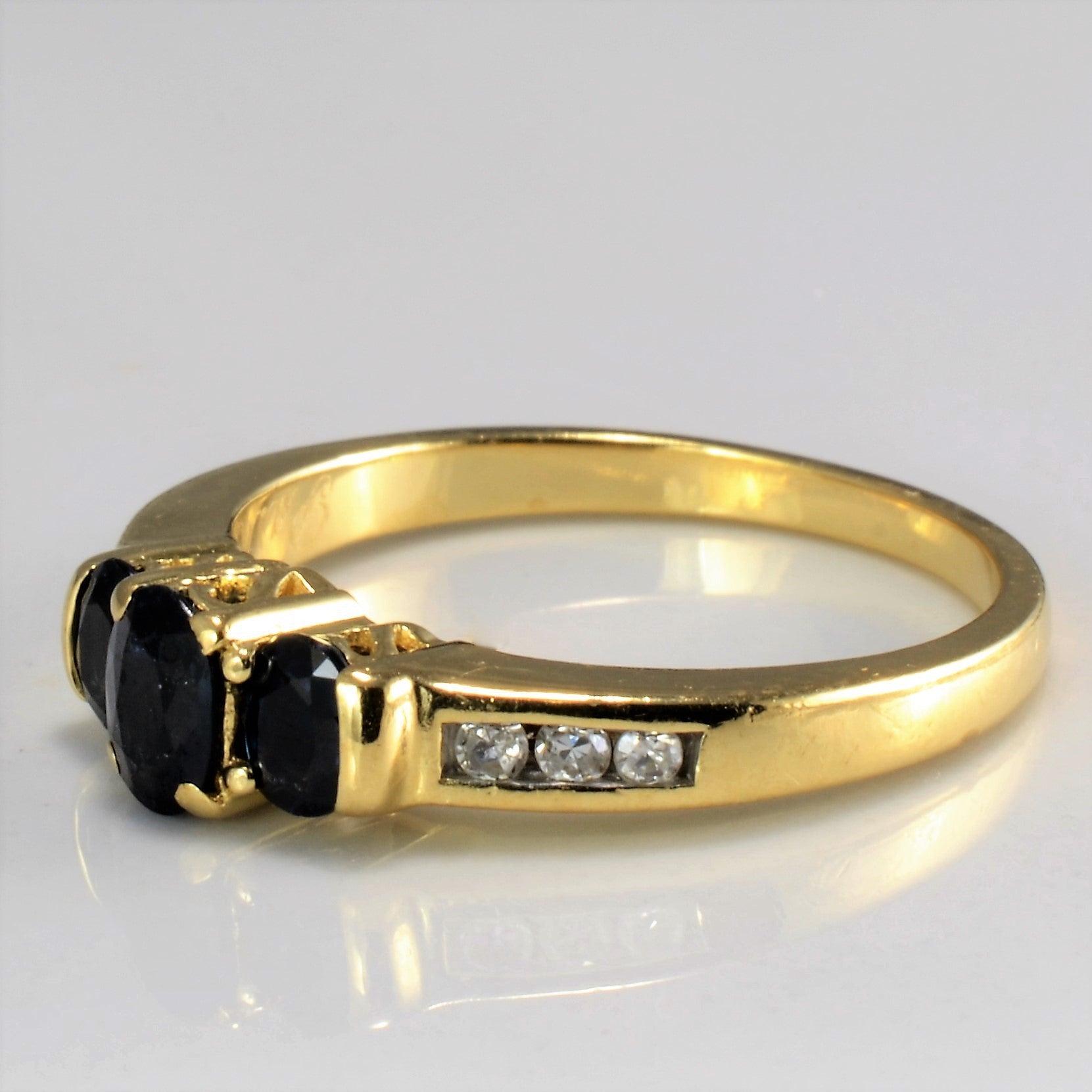 Three Stone Sapphire & Diamond Ring | 0.68ctw, 0.10 ctw | SZ 7.25