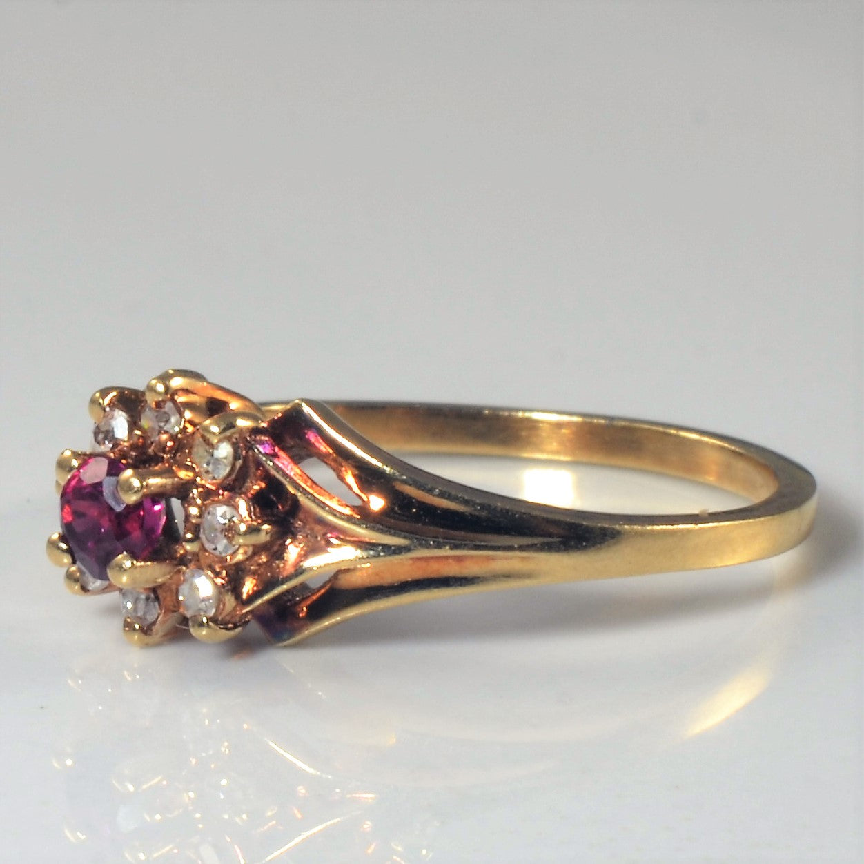 Ruby & Diamond Halo Ring | 0.25ct, 0.08ctw | SZ 6.75 |