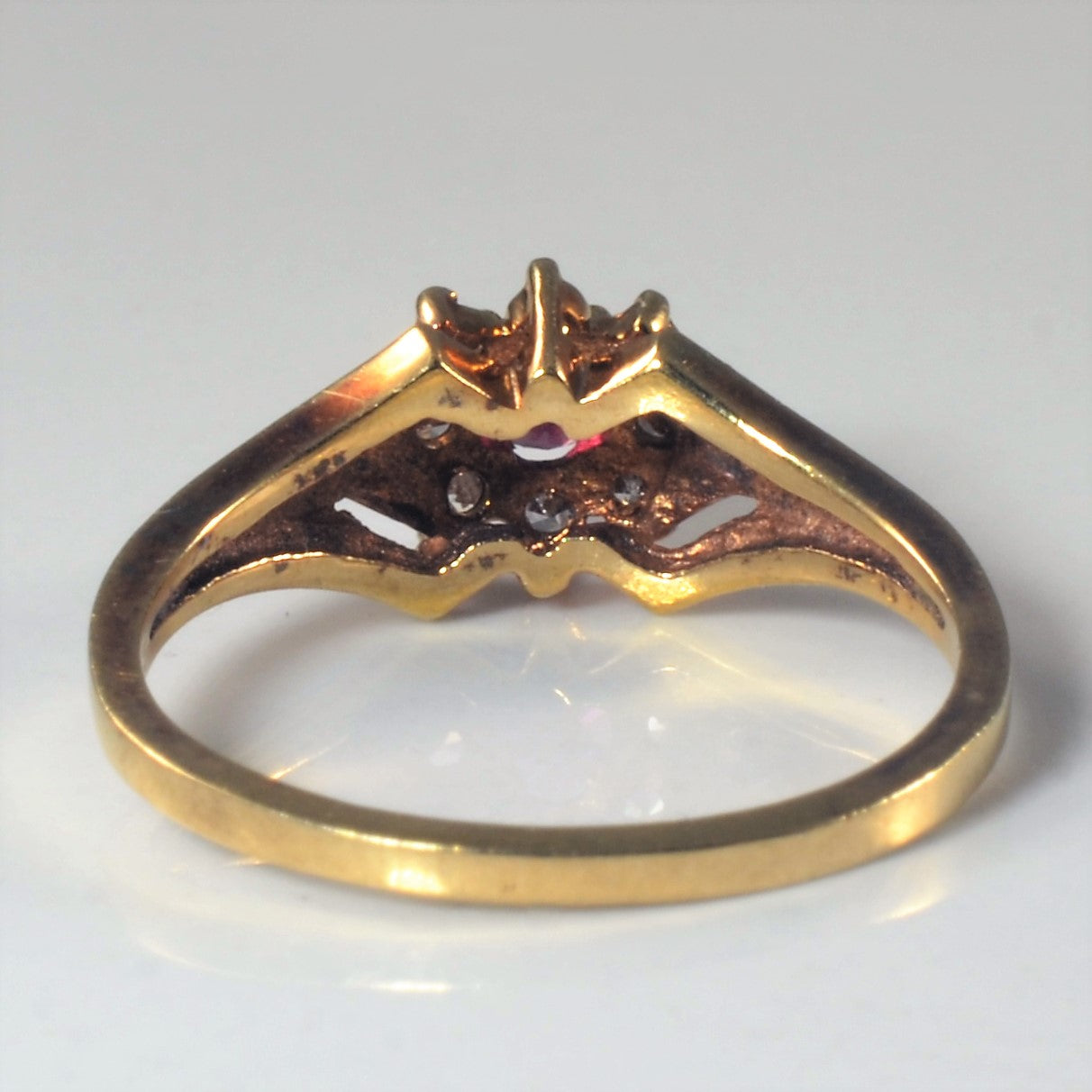 Ruby & Diamond Halo Ring | 0.25ct, 0.08ctw | SZ 6.75 |