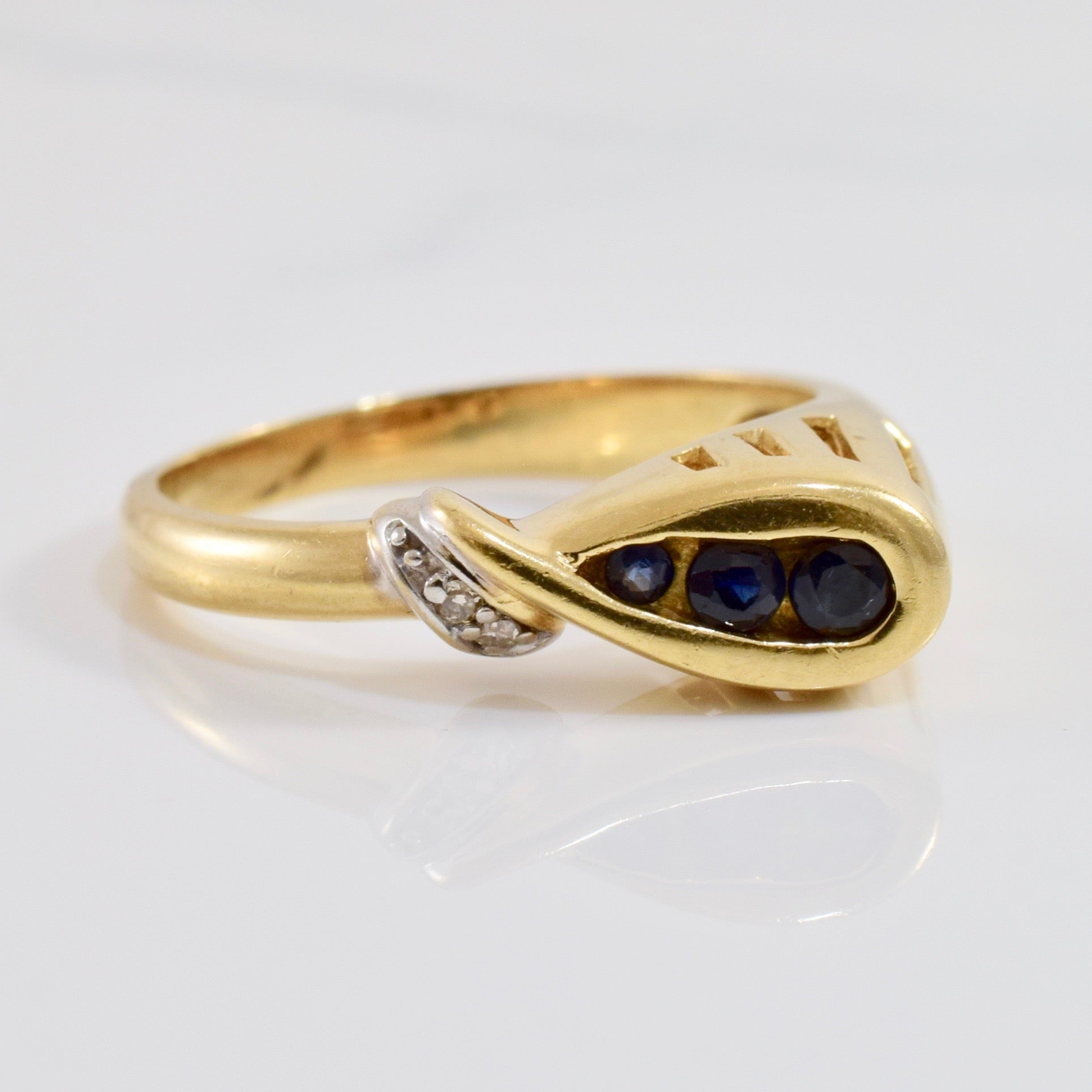 Sapphire and Diamond Loop Ring | 0.01 ctw SZ 6 |