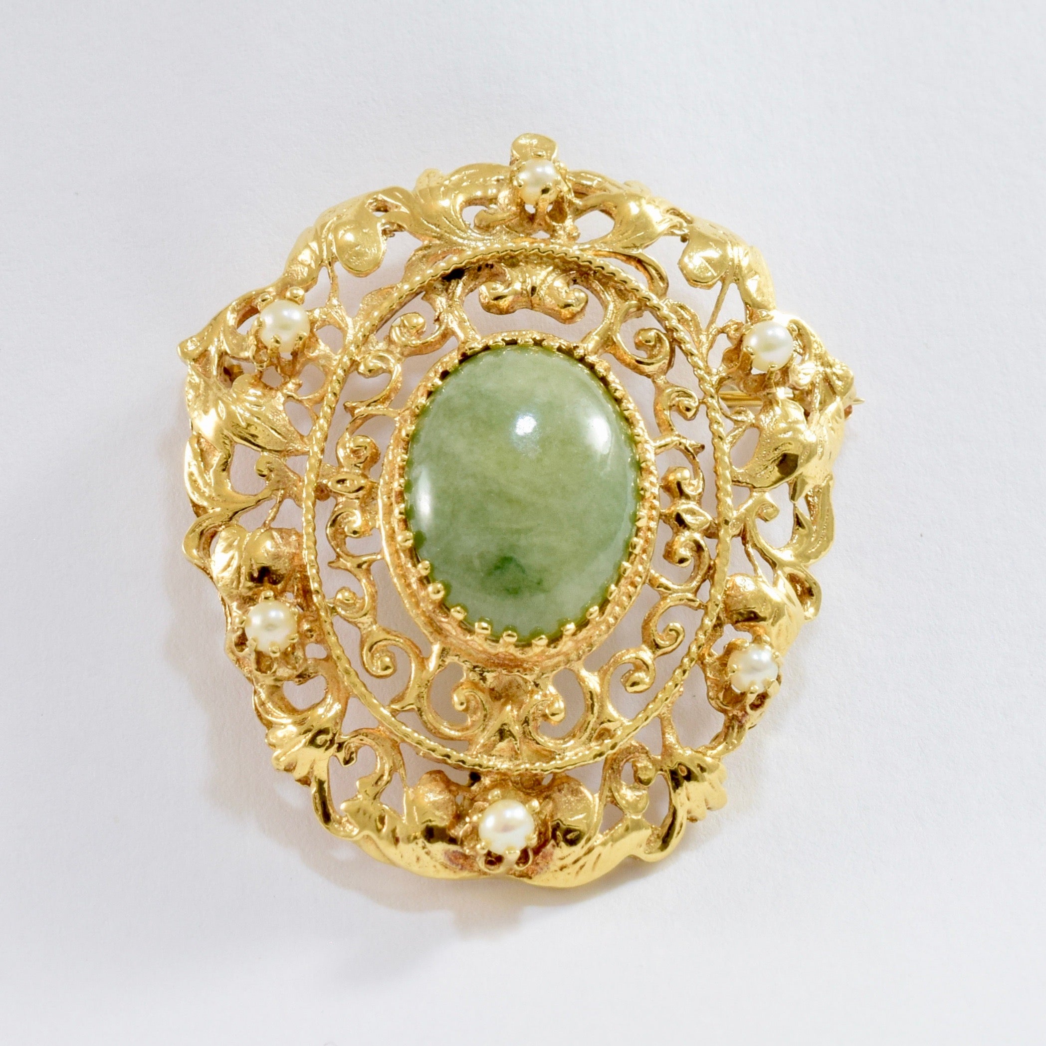 Jade brooch on sale