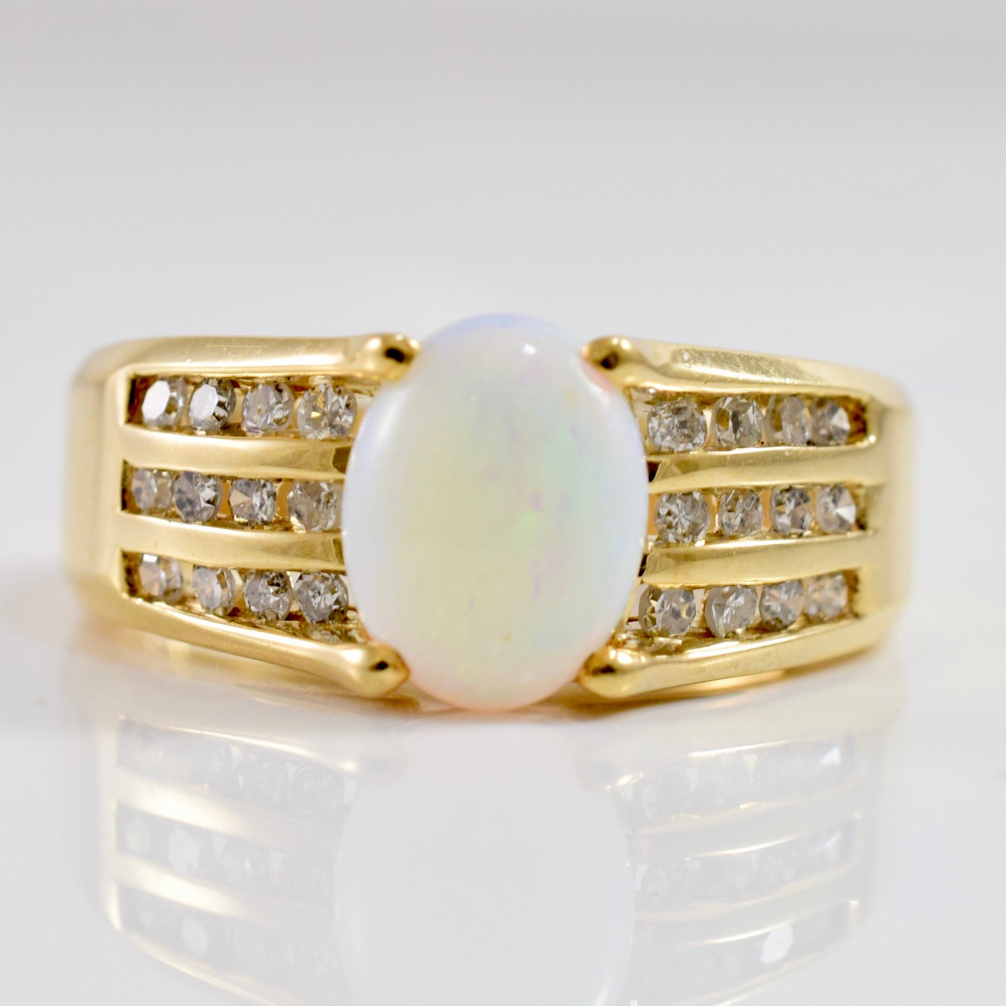 Bague avec opale et diamants | 0,30 ct au total | Taille 7,5 |