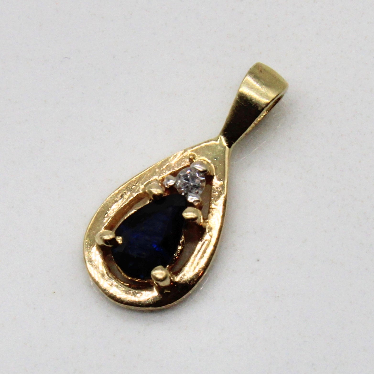 Pear Cut Sapphire & Diamond Pendant | 0.20ct, 0.01ct |