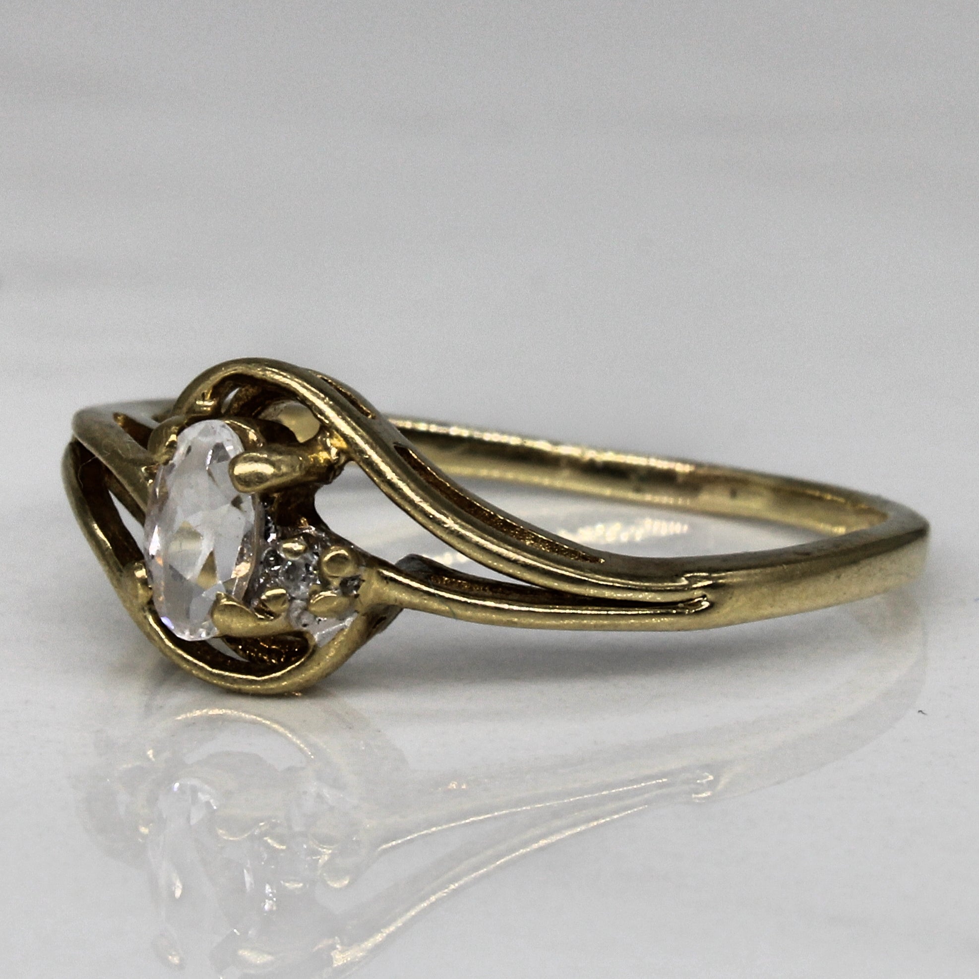 Topaz & Diamond Cross Over Ring | 0.16ct, 0.01ct | SZ 7.25 |