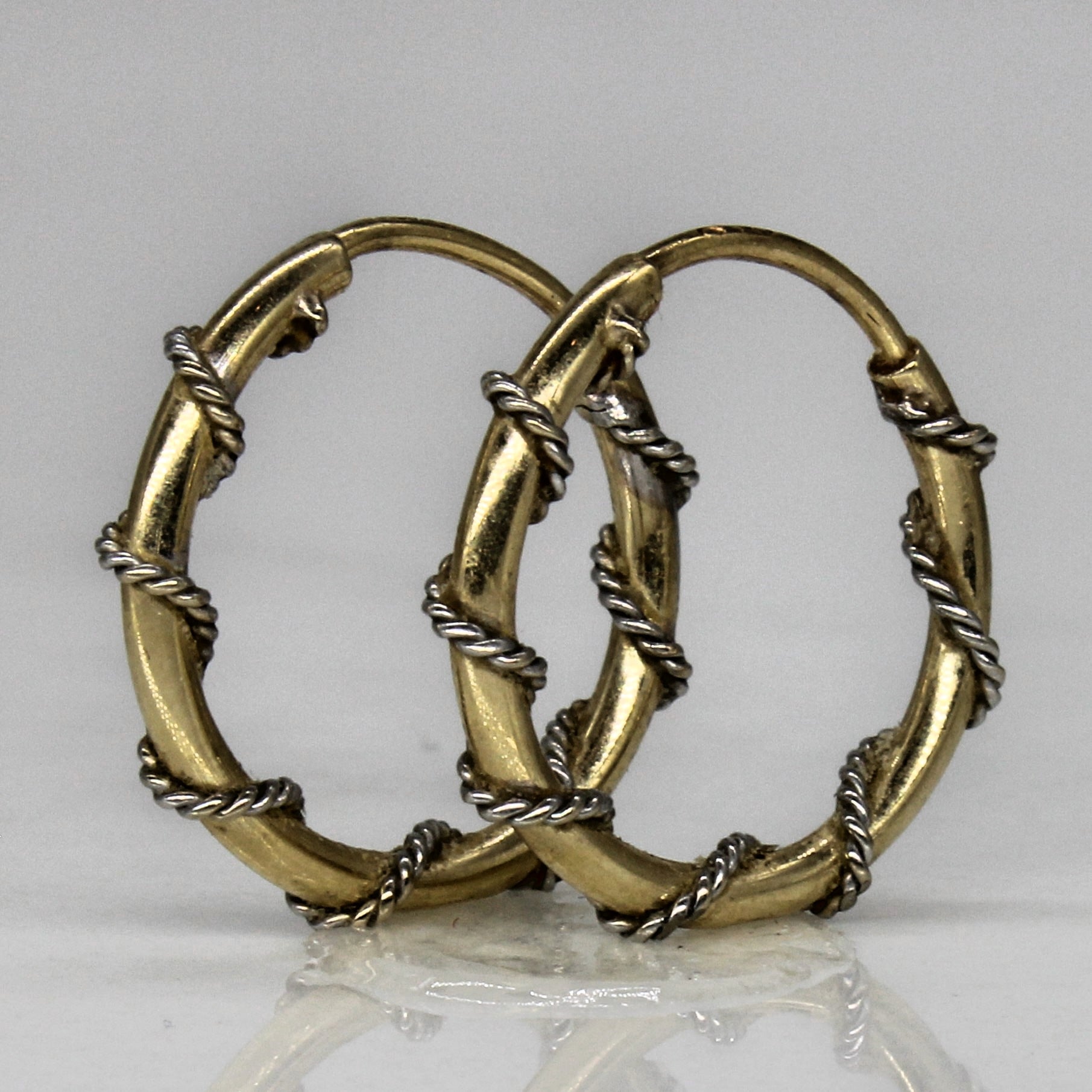 Boucles d'oreilles créoles en or enroulé |