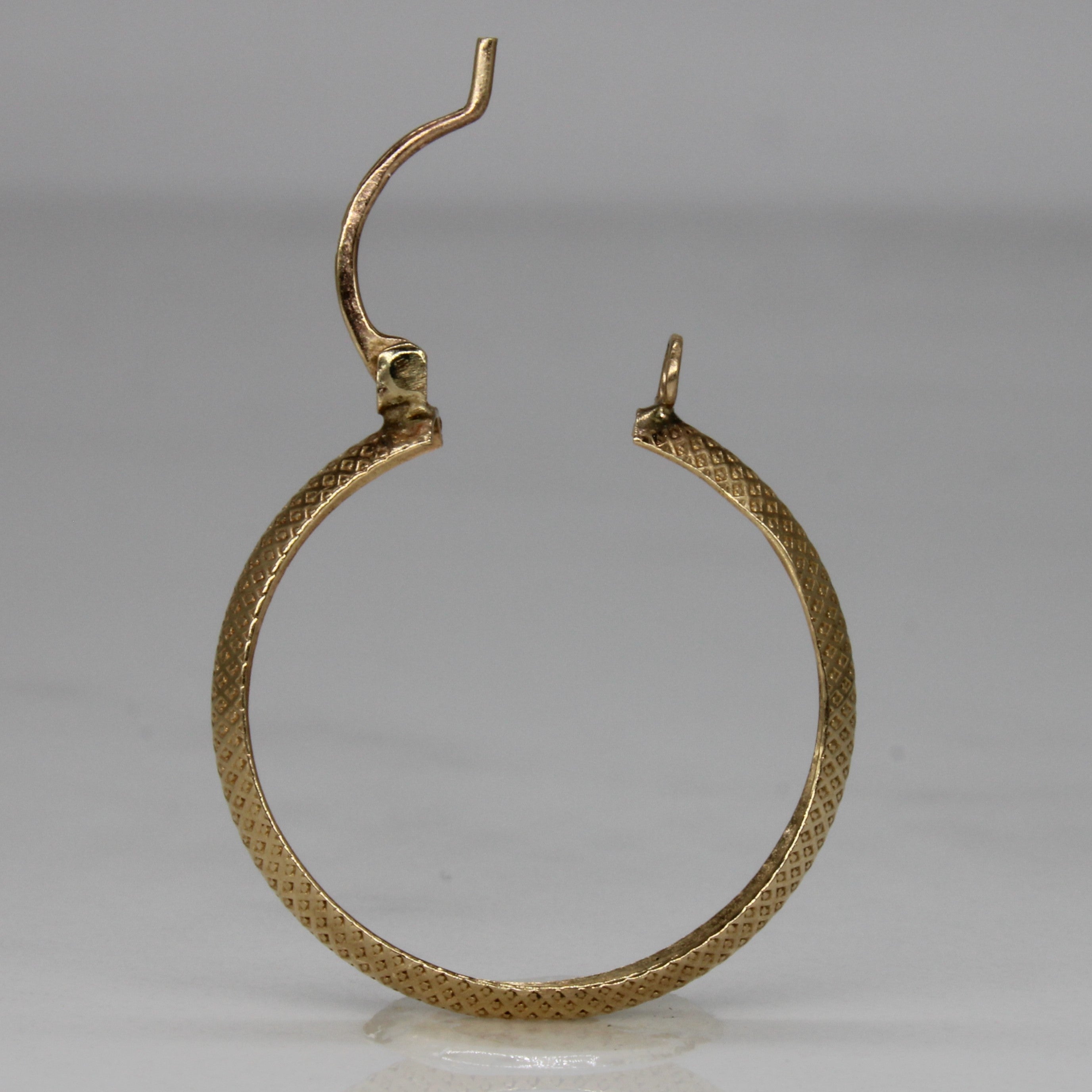 Boucles d'oreilles créoles texturées en or jaune 10 carats |