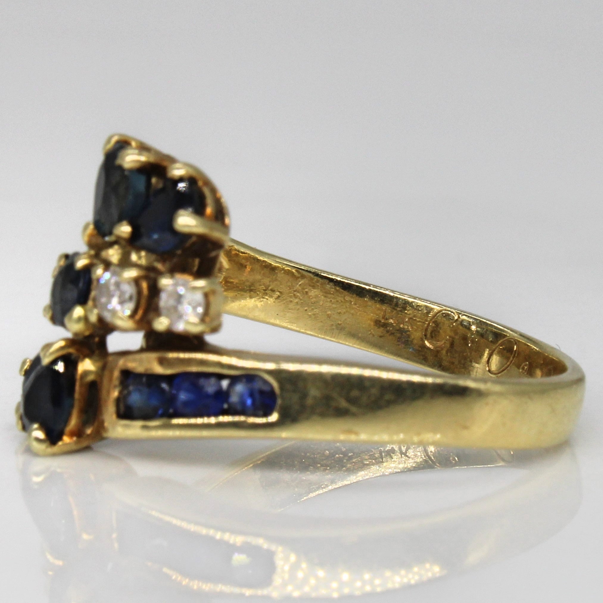 Unique Sapphire & Diamond Bypass Ring | 0.72ctw, 0.12ctw | SZ 8 |