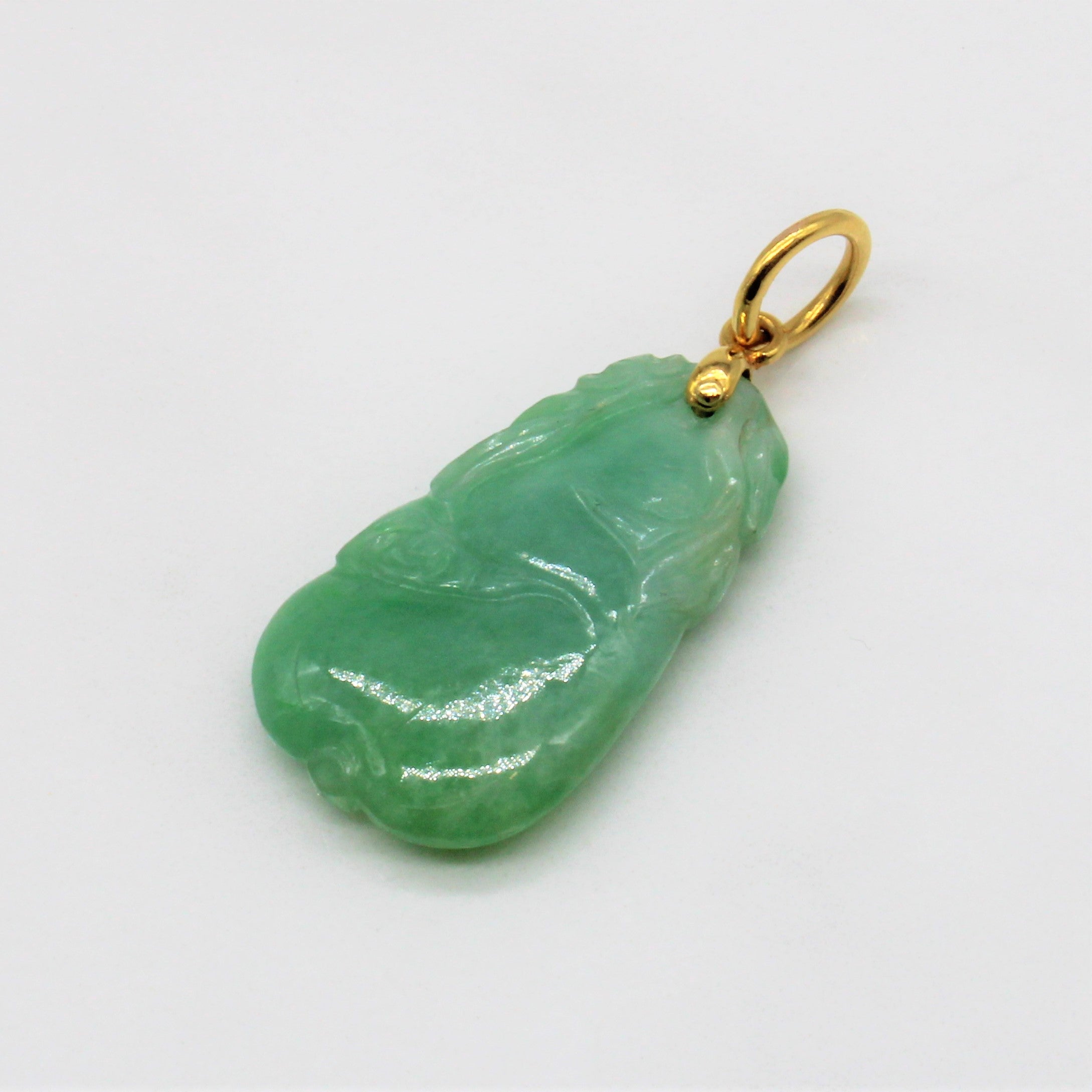 Carved Jadeite Pendant |