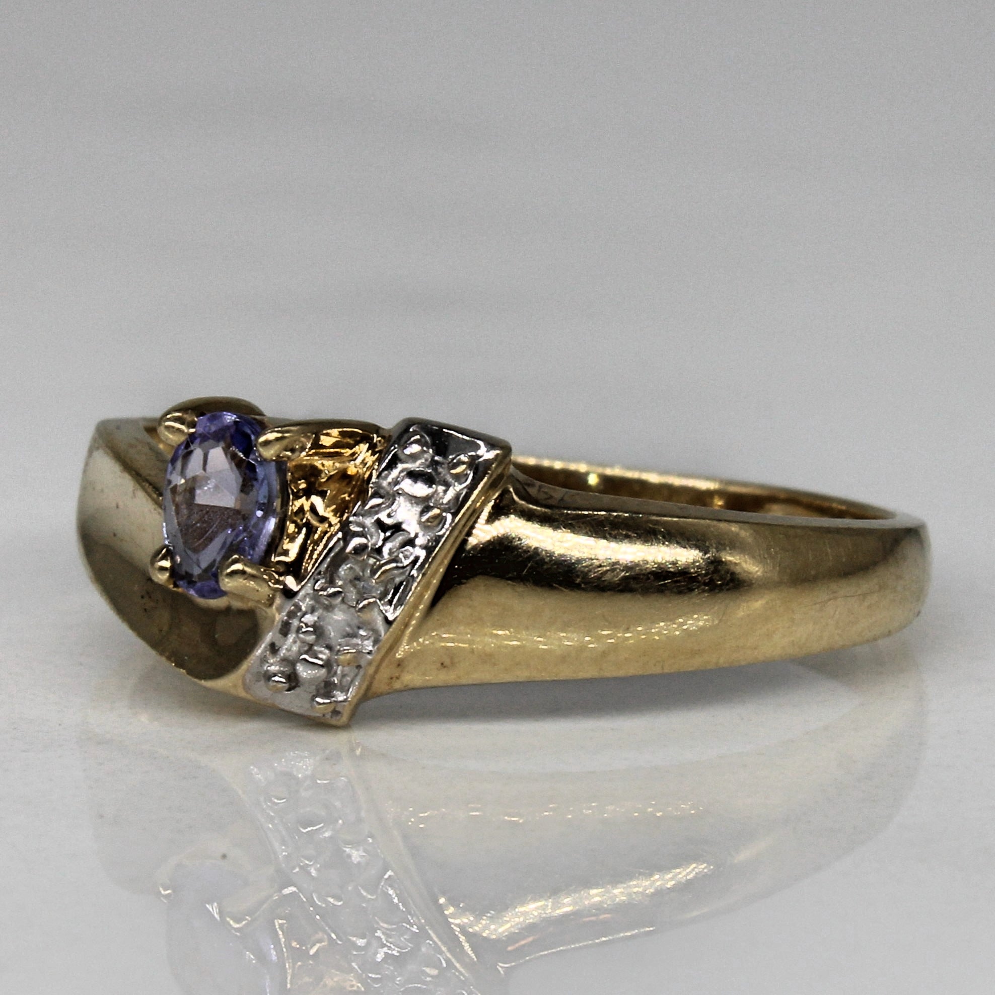 Tanzanite & Diamond Ring | 0.12ct, 0.01ct | SZ 7 |