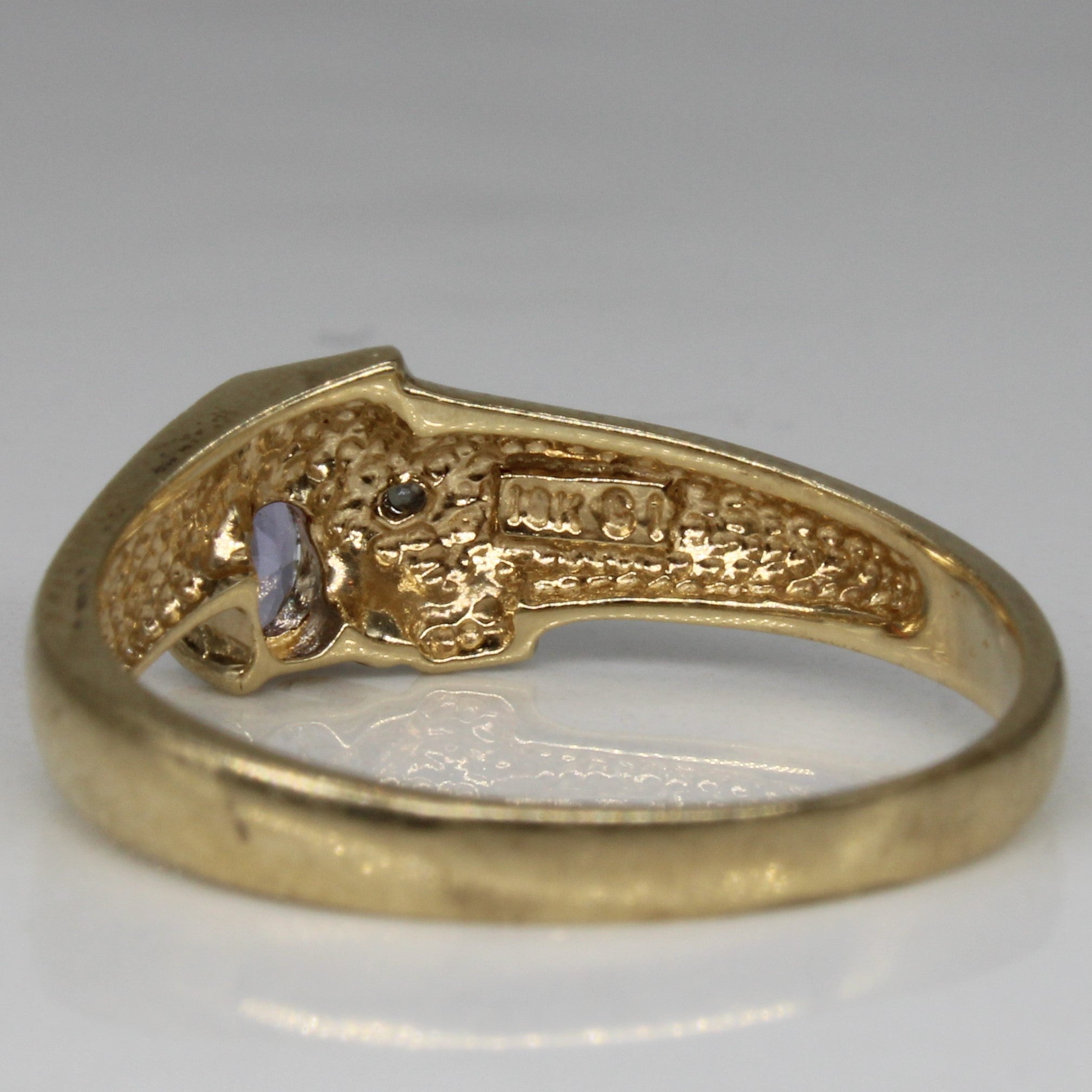 Tanzanite & Diamond Ring | 0.12ct, 0.01ct | SZ 7 |