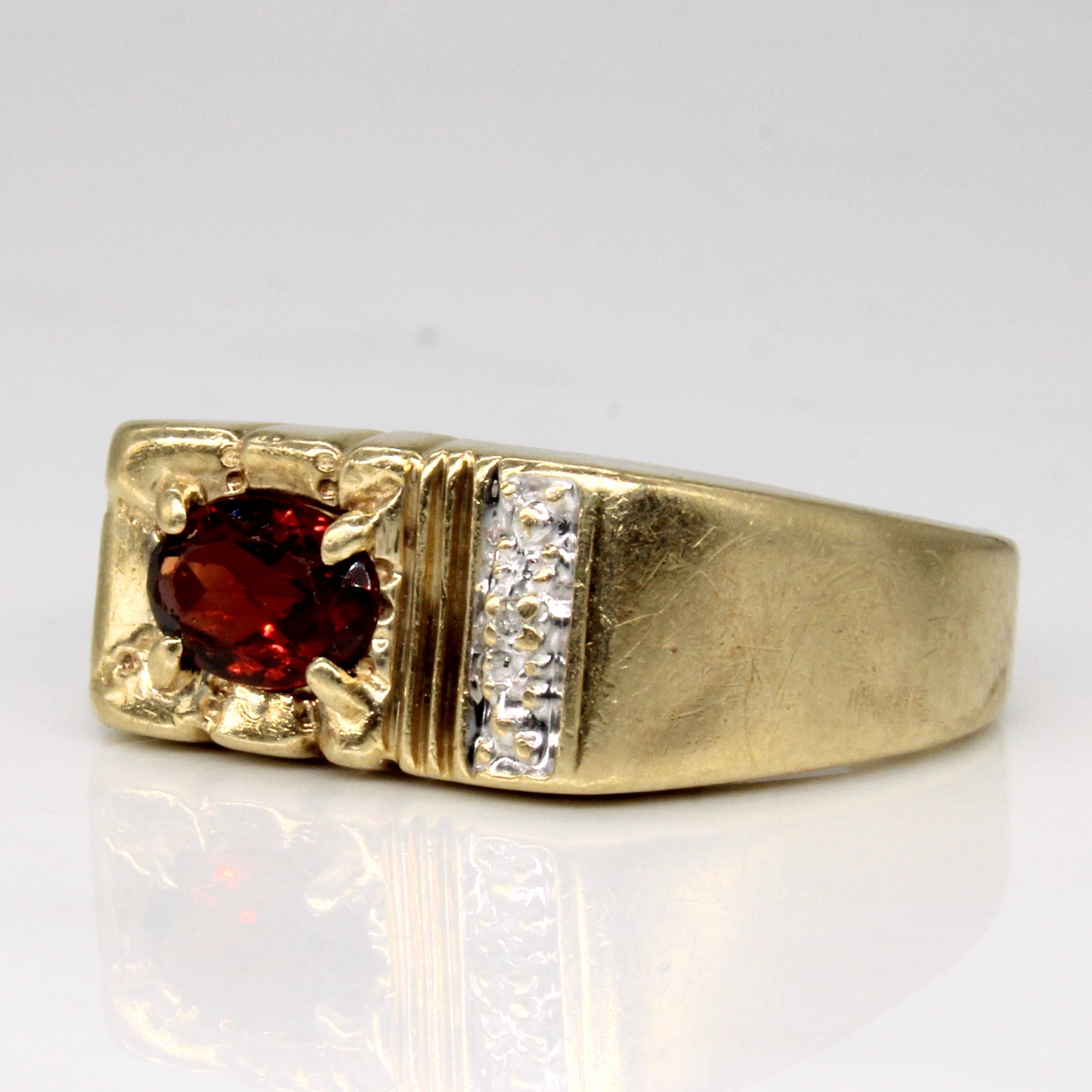 Garnet & Diamond Ring | 0.70ct, 0.01ct | SZ 9.5 |