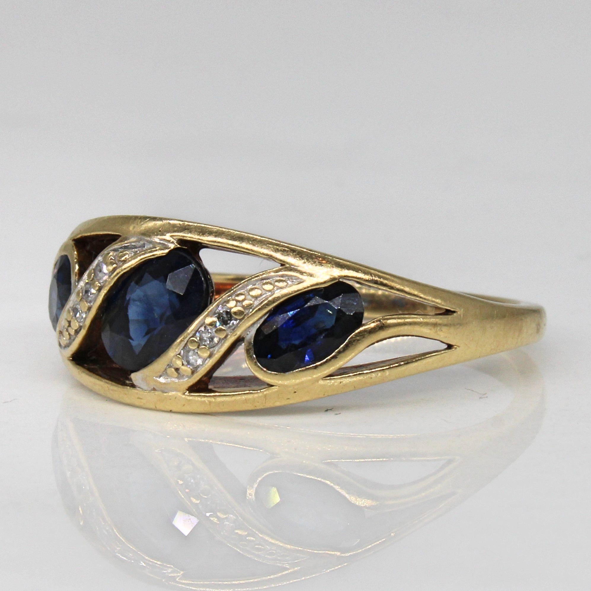 Synthetic Sapphire & Diamond Cross Over Ring | 1.10ctw, 0.02ctw | SZ 7 |