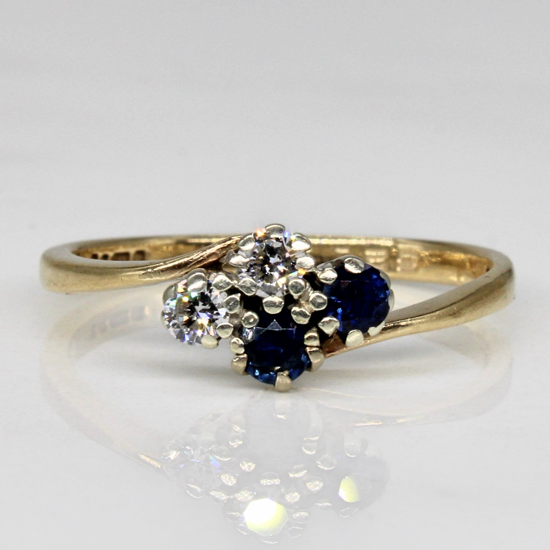 Synthetic Sapphire & Diamond Cross Over Ring | 0.18ctw, 0.15ctw | SZ 7.25 |