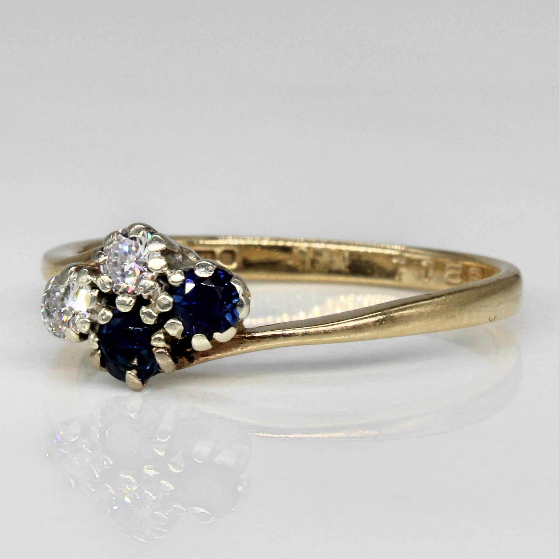 Synthetic Sapphire & Diamond Cross Over Ring | 0.18ctw, 0.15ctw | SZ 7.25 |