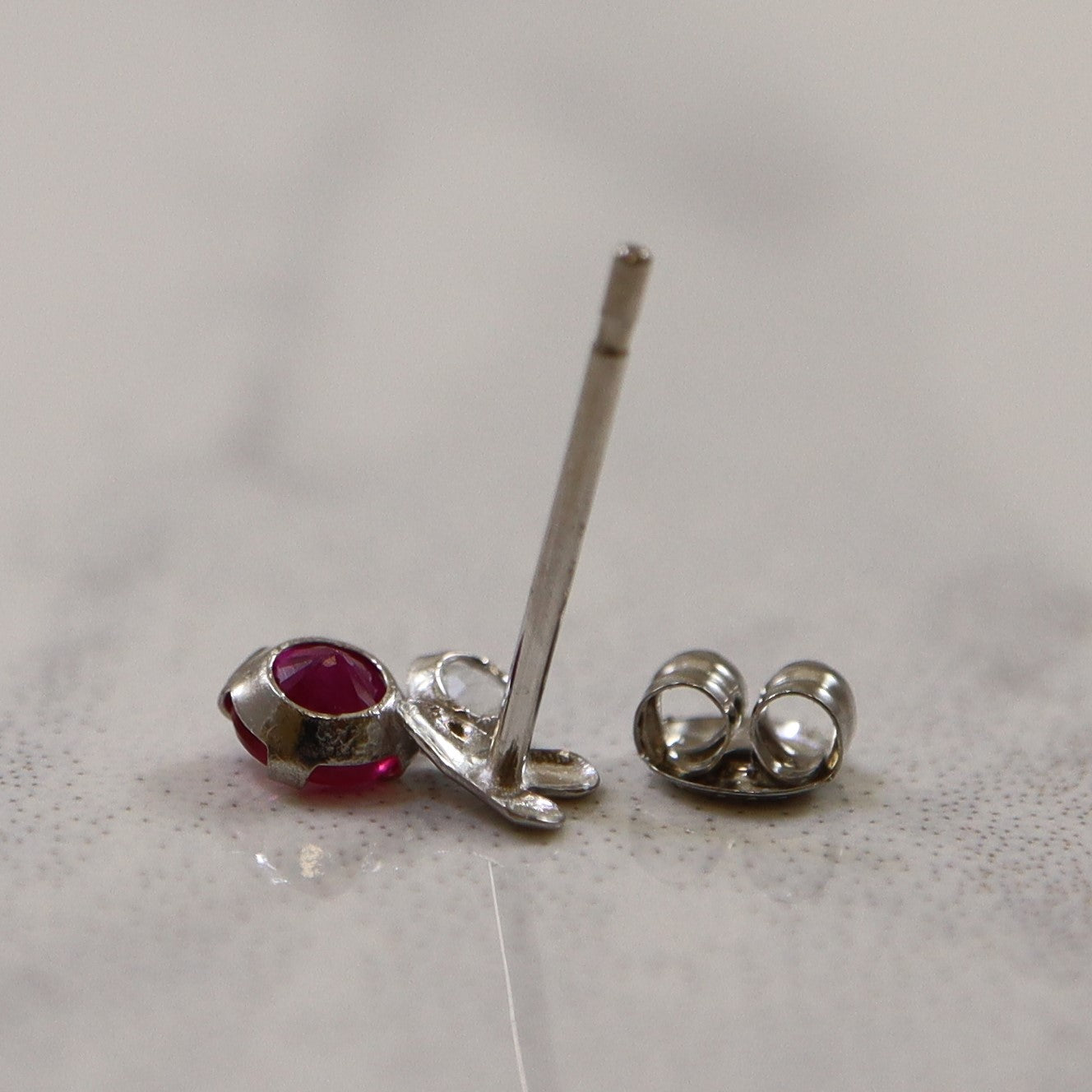 White Sapphire & Ruby Platinum Stud Earrings | 0.30ctw |