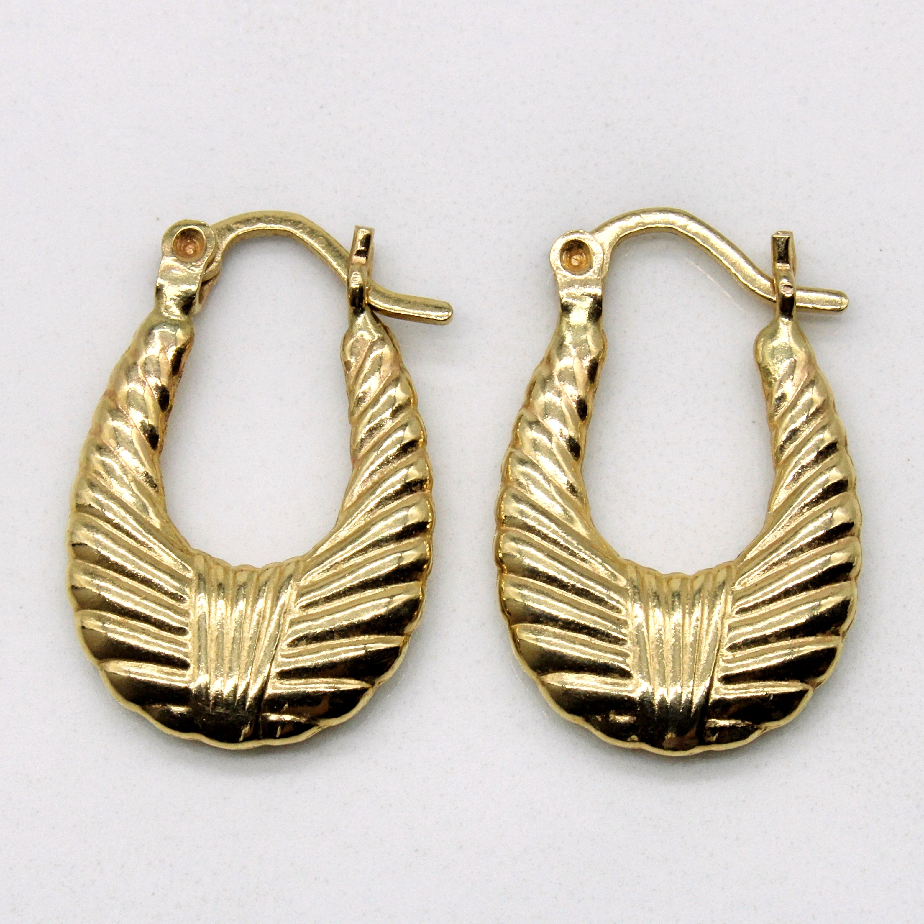Boucles d'oreilles créoles ovales texturées |