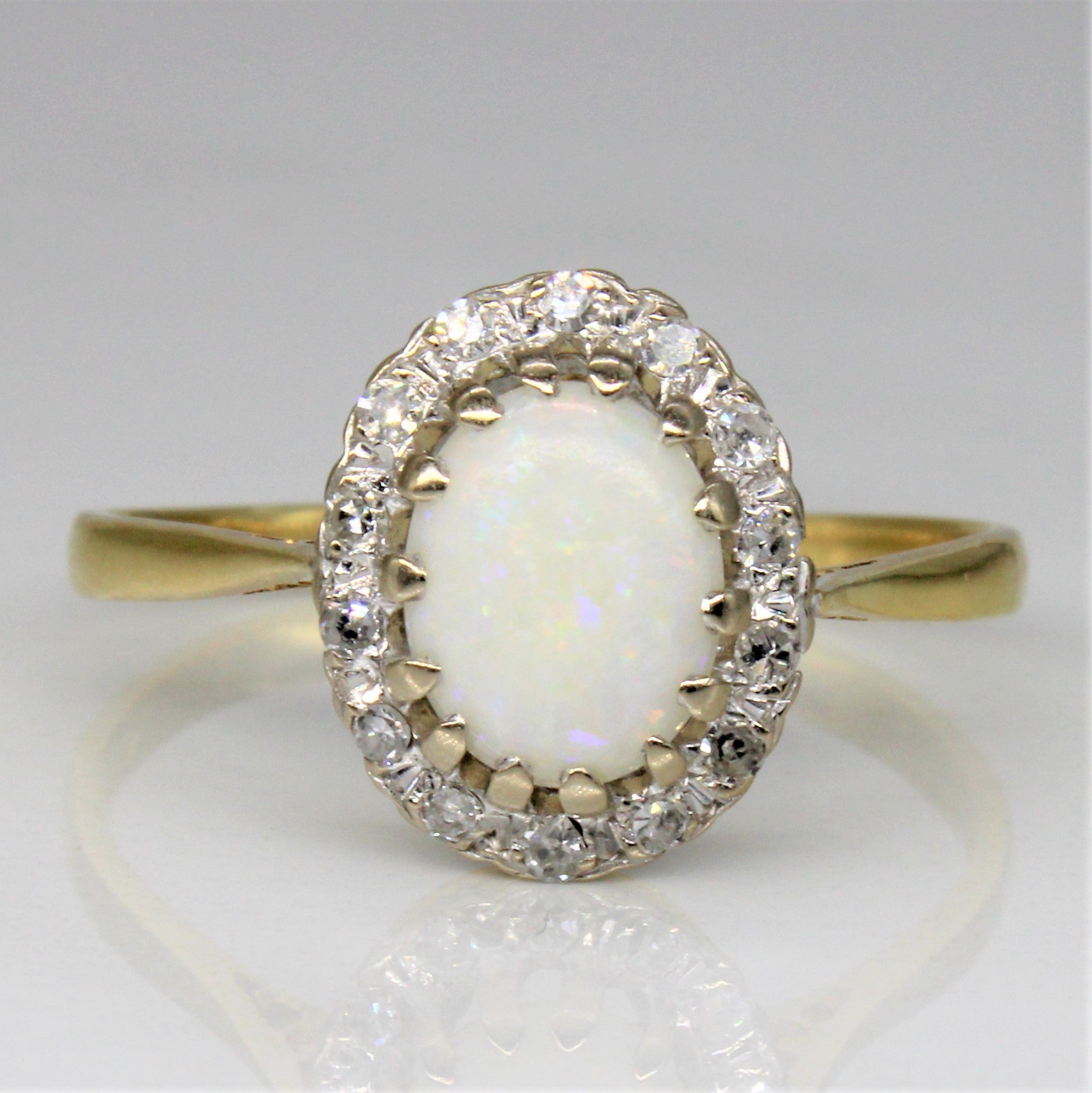 Bague cocktail en opale et diamants | 0,85 ct, 0,14 ct au total | Taille 12,25 |