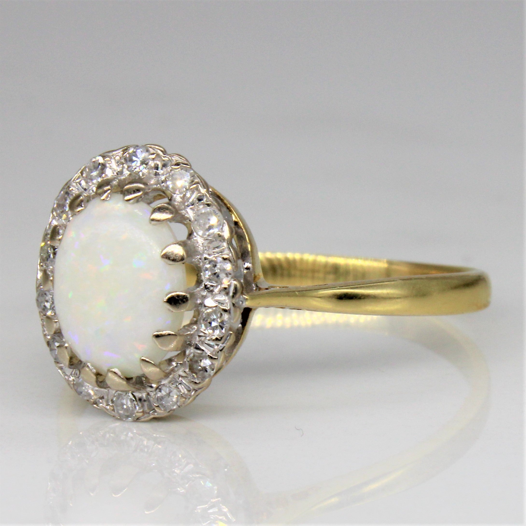 Bague cocktail en opale et diamants | 0,85 ct, 0,14 ct au total | Taille 12,25 |