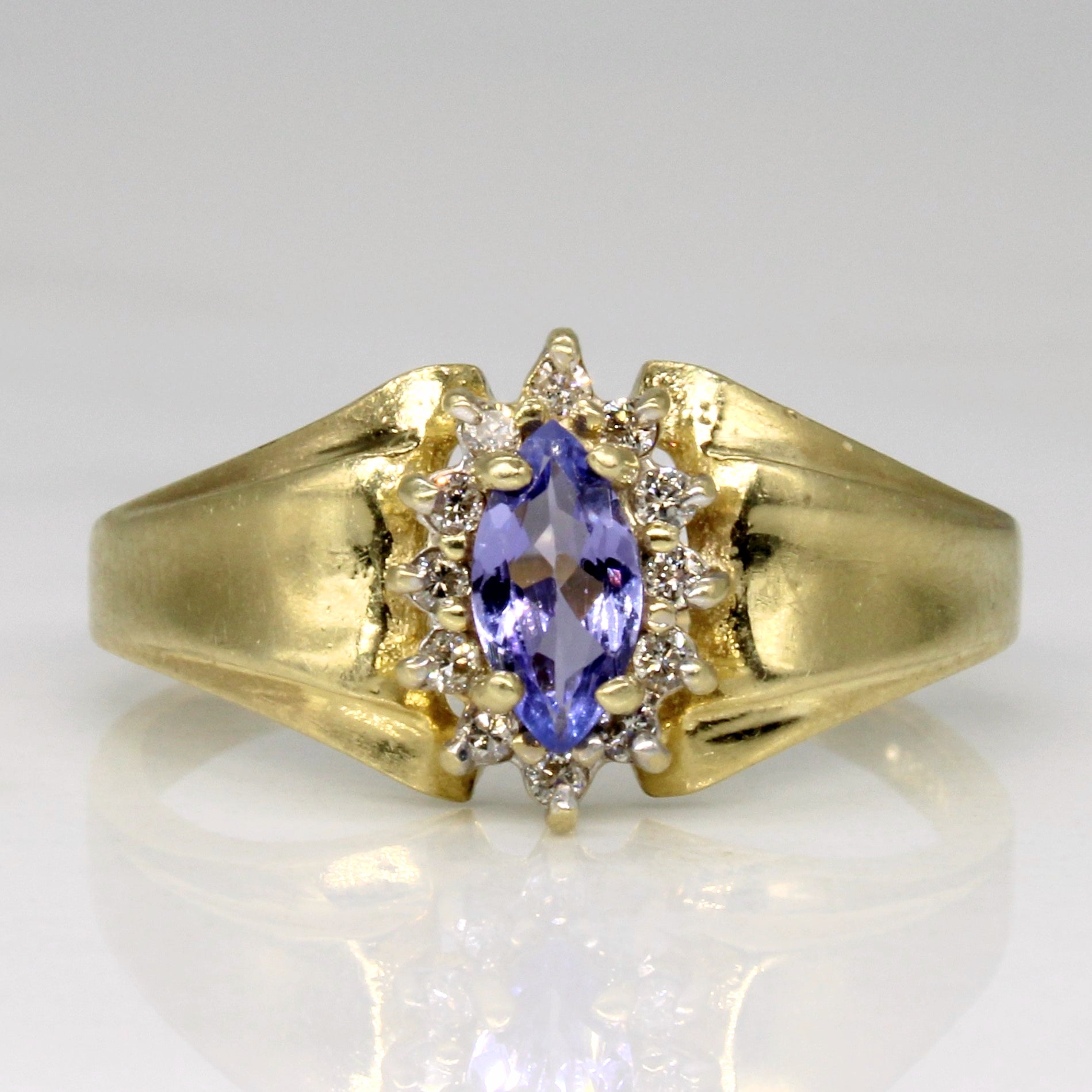 Tanzanite & Diamond Halo Ring | 0.25ct, 0.07ctw | SZ 8.75 |