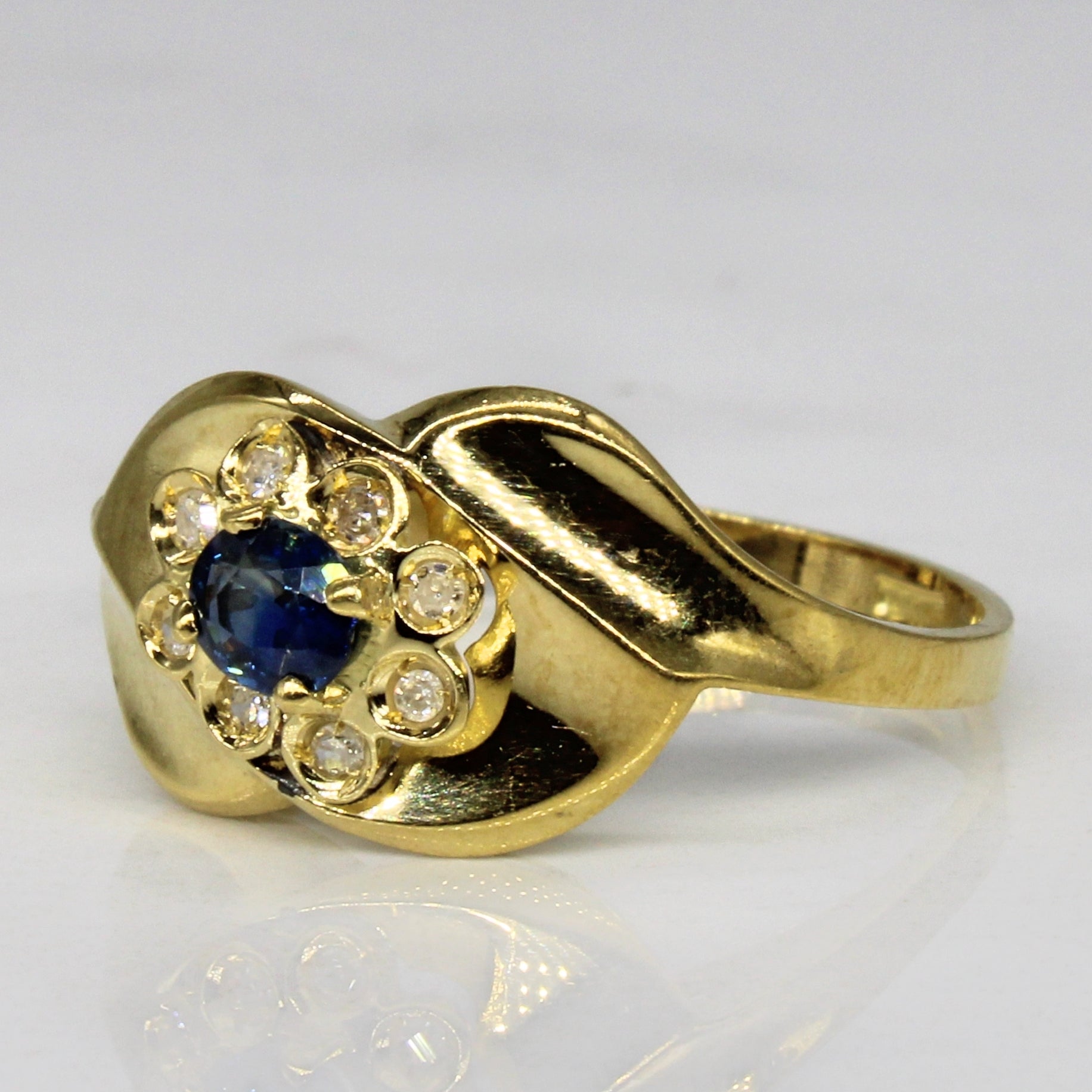 Sapphire & Diamond Cluster Ring | 0.20ct, 0.04ctw | SZ 7.25 |