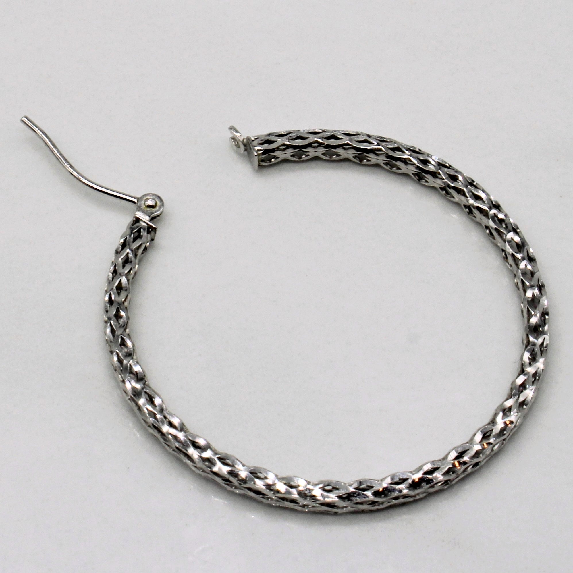 White Gold Woven Hoop Earrings |