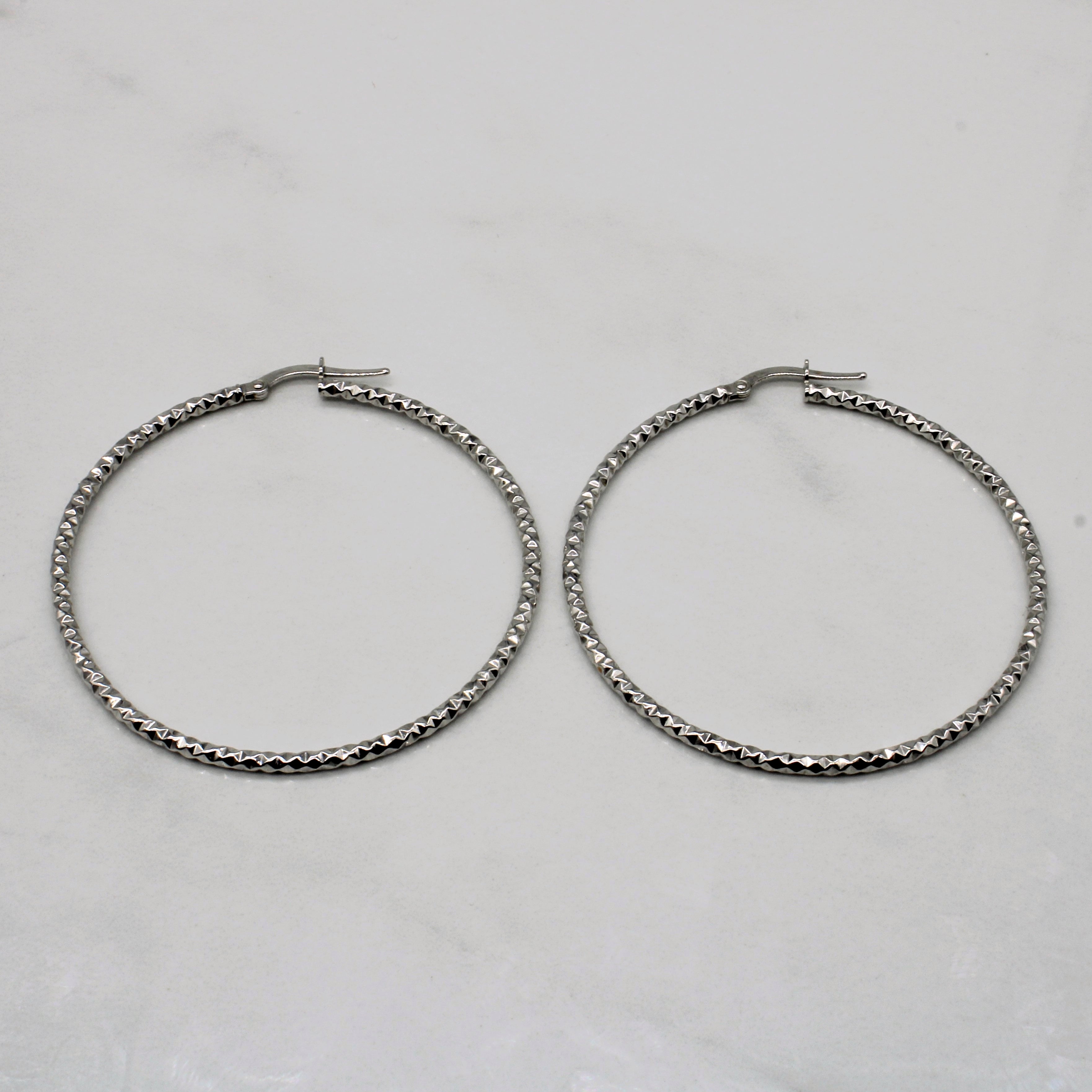 Boucles d'oreilles créoles en or blanc étincelant |