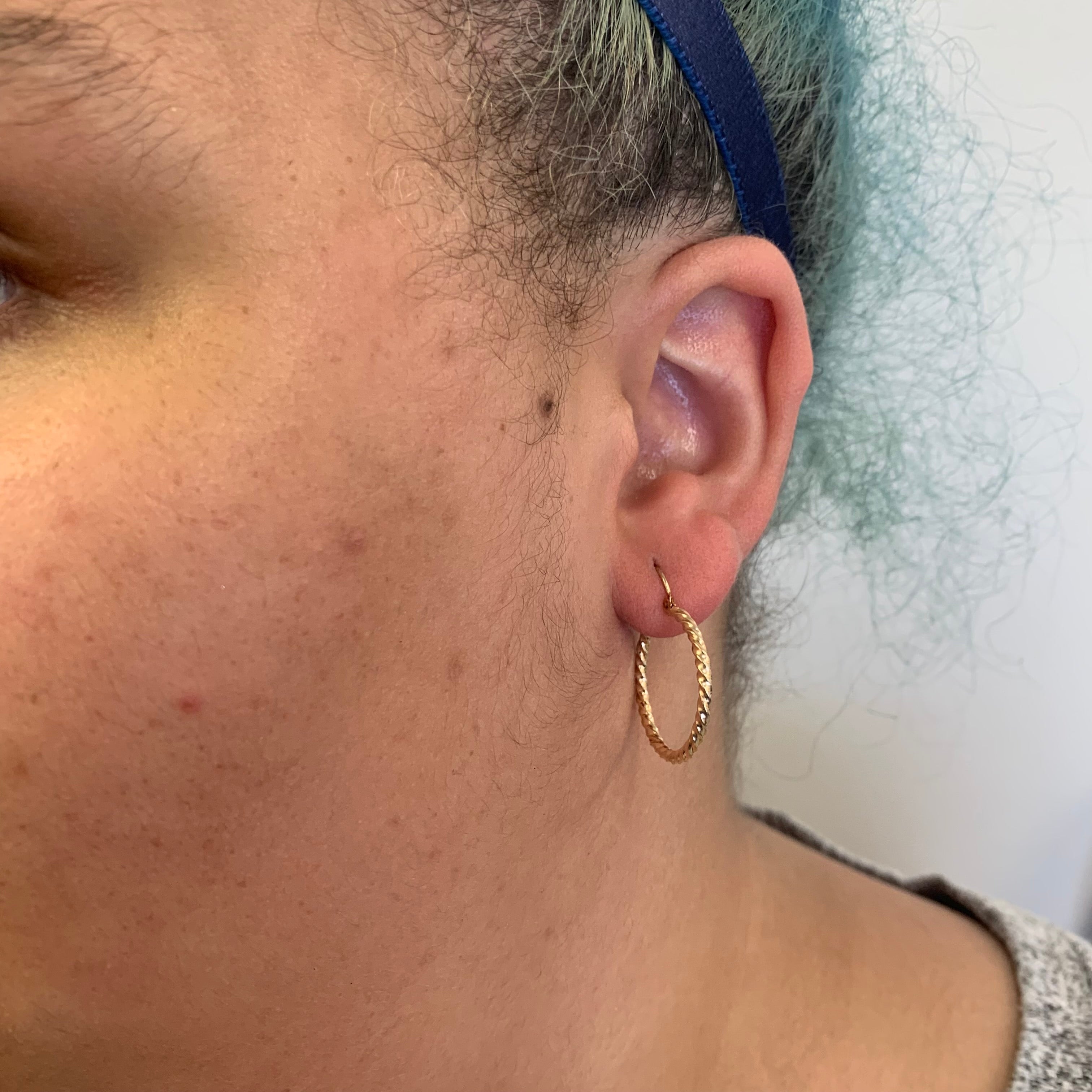 Boucles d'oreilles créoles torsadées en or jaune 10 carats |