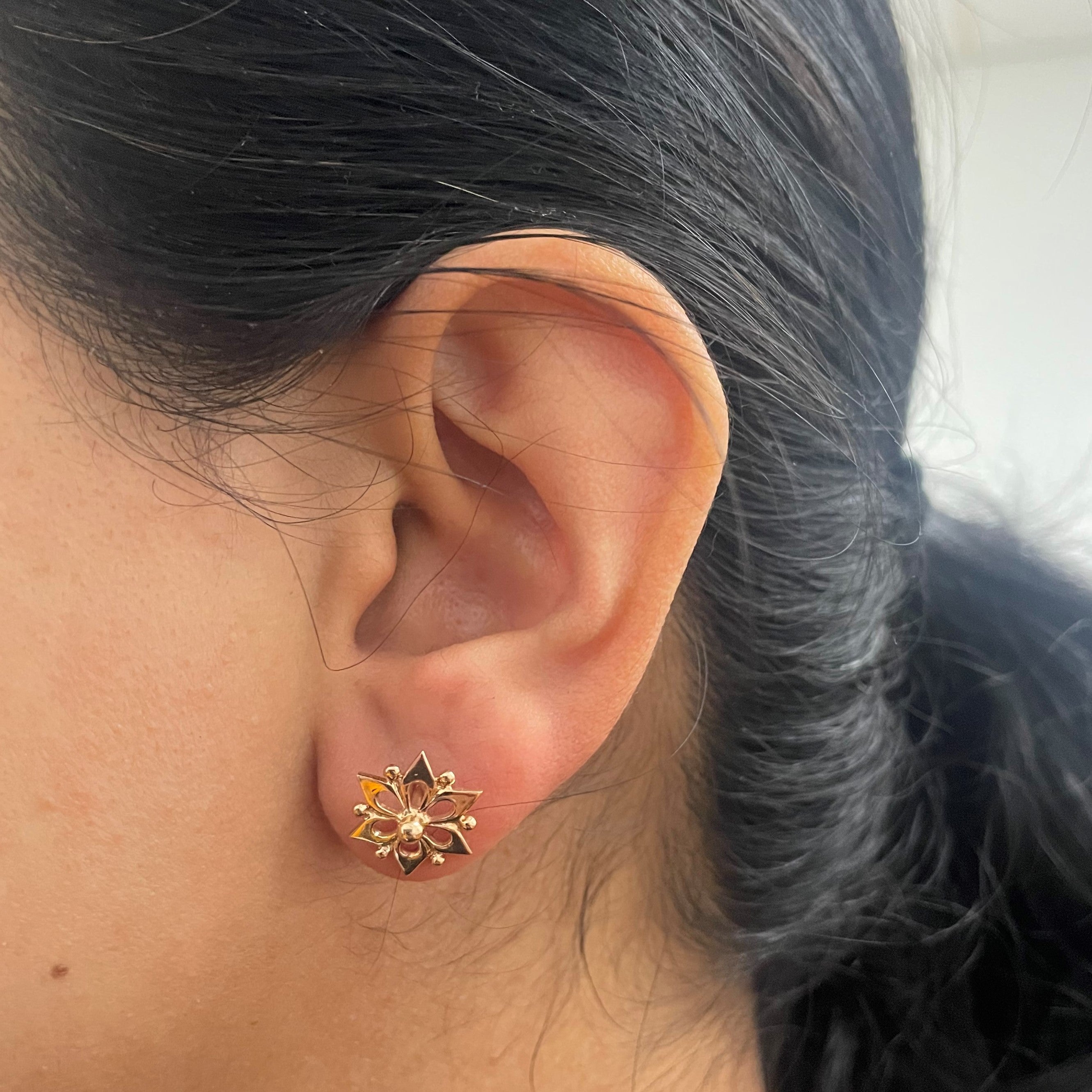 Floral Design Gold Stud Earrings