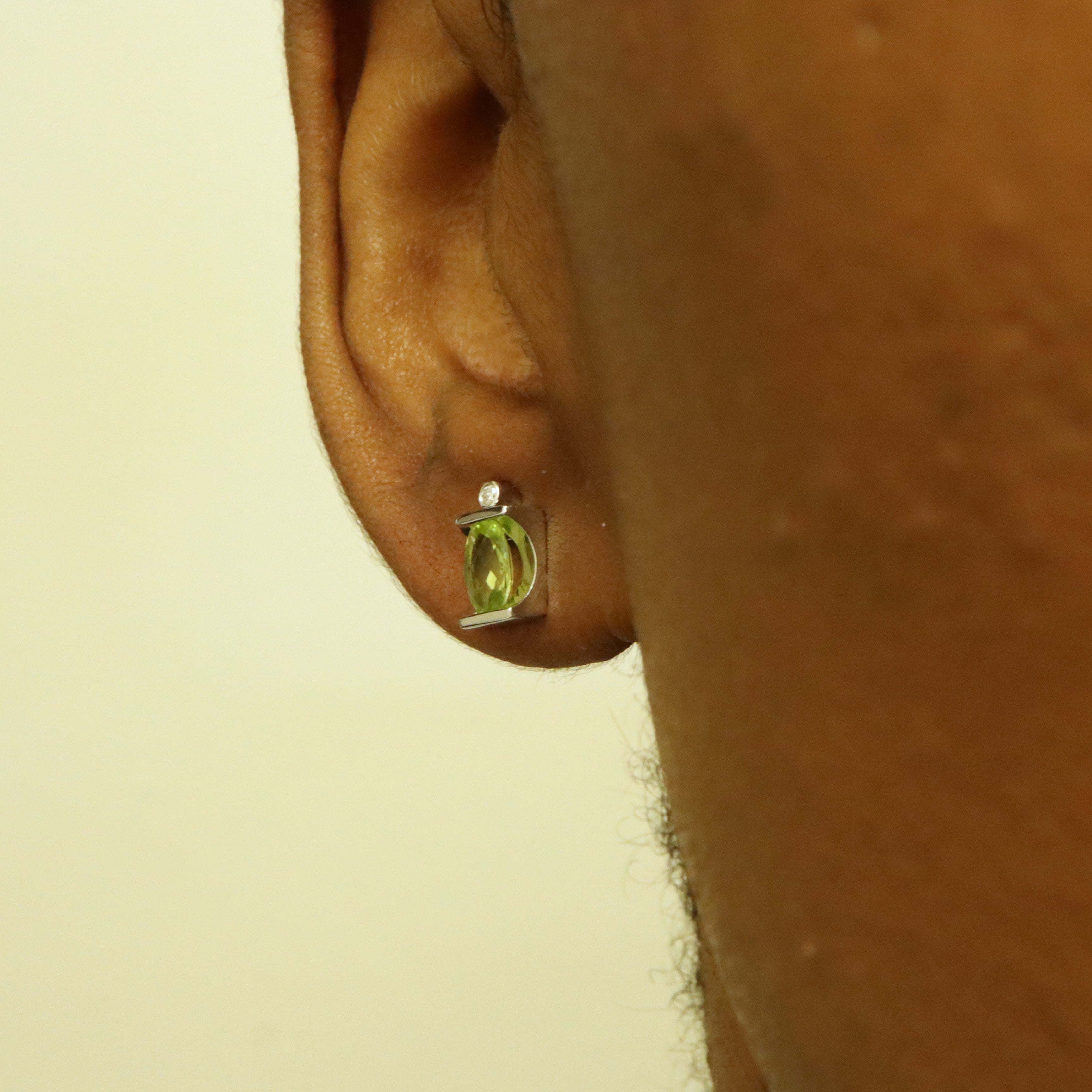 Tension Set Peridot & Diamond Stud Earrings | 1.40ctw, 0.02ctw |