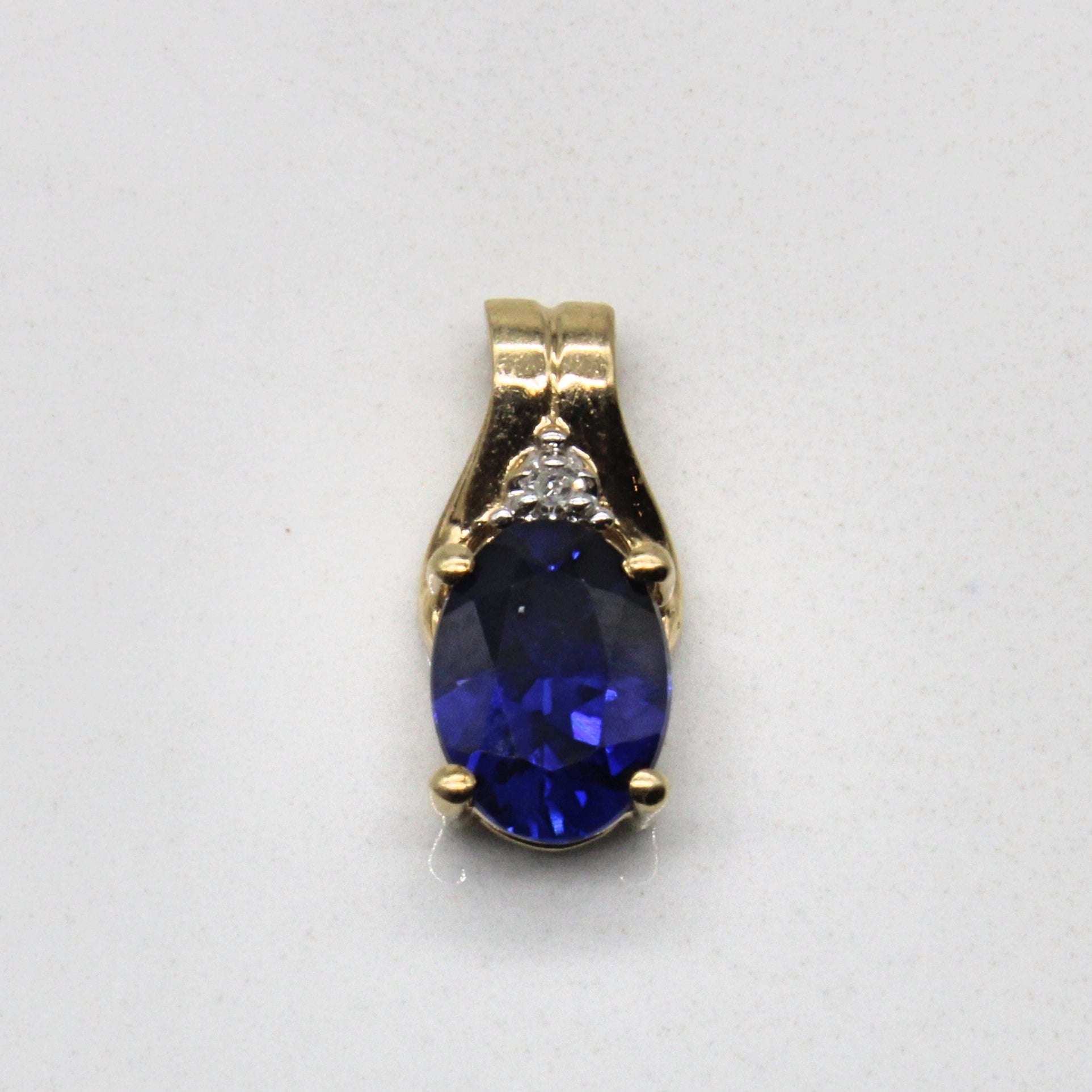 Sapphire & Diamond Pendant | 0.85ct, 0.01ct |