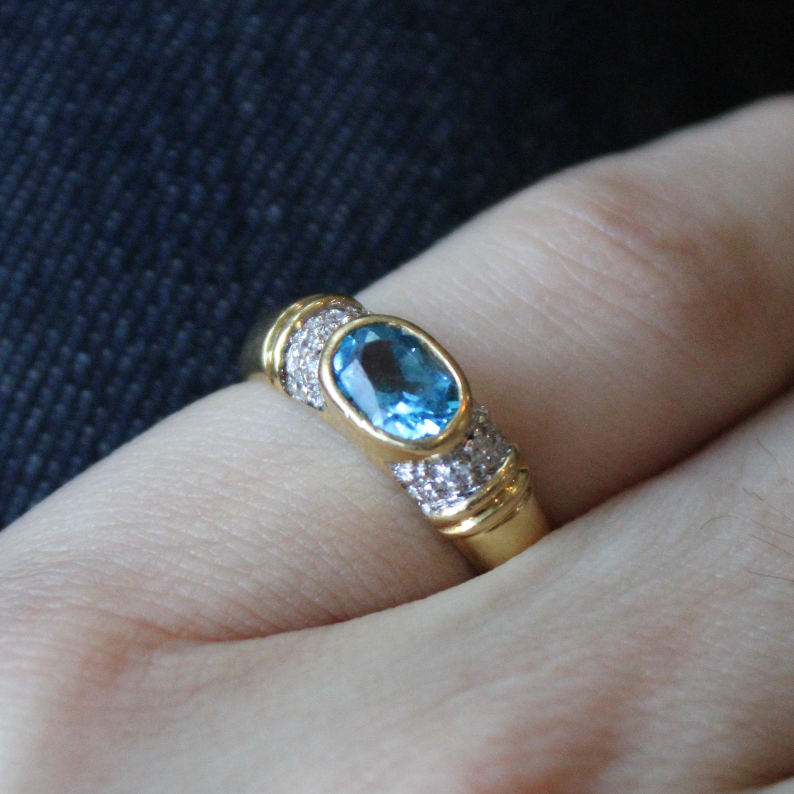 East West Bezel Set Blue Topaz Ring | 0.88ct, 0.06ctw | SZ 6.25 |