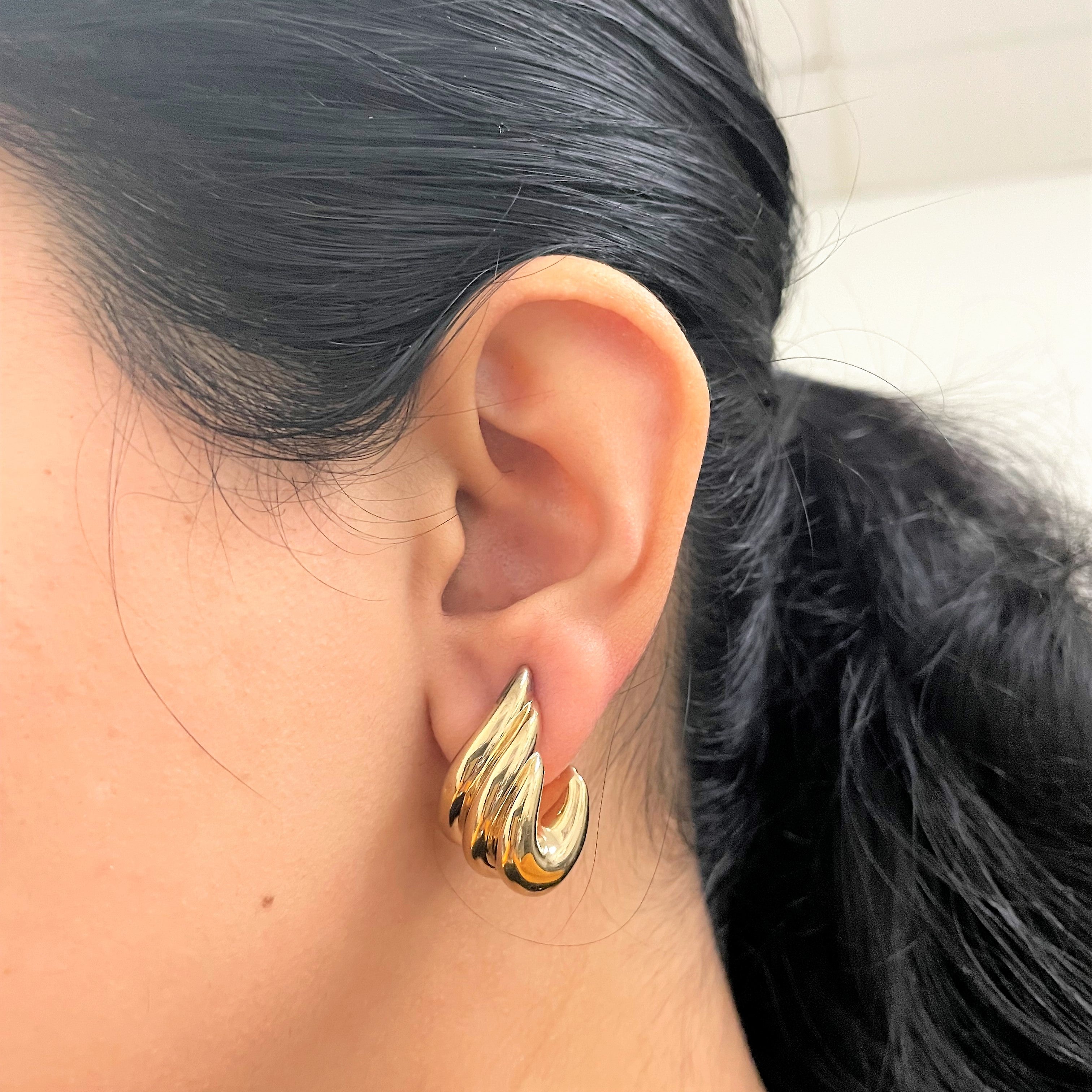 Boucles d'oreilles pendantes ondulées |