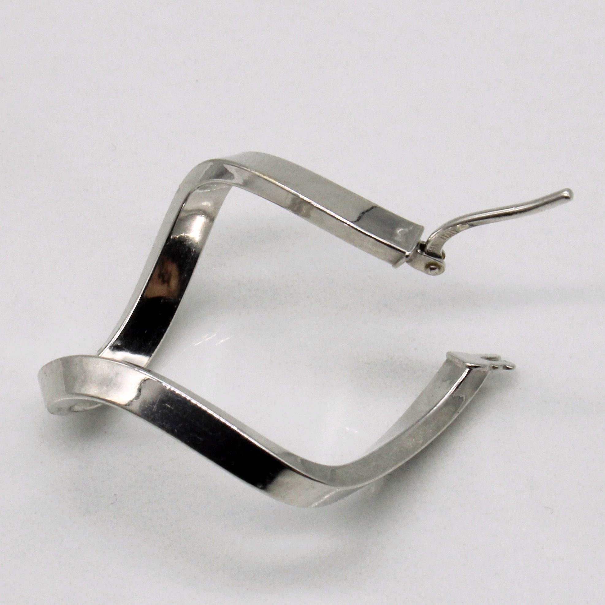 White Gold Oval Twist Hoops |