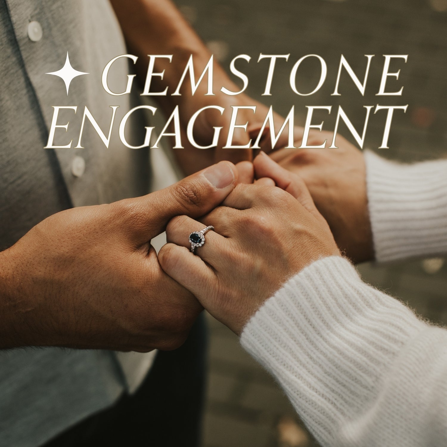 Close-up of hands with a sapphire gemstone engagement ring, featuring text overlay: gemstone engagement: your love in full colour