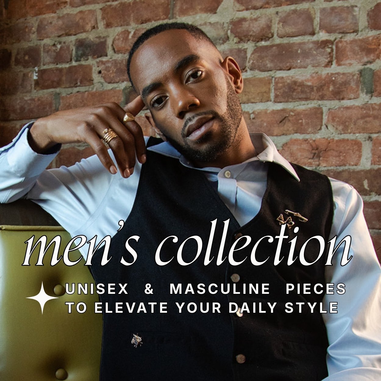 Man leaning against a brick wall wearing a vest over button down and unique vintage gold jewellery. Text overlay reads: men's collection: unisex & masculine pieces to elevate your daily style