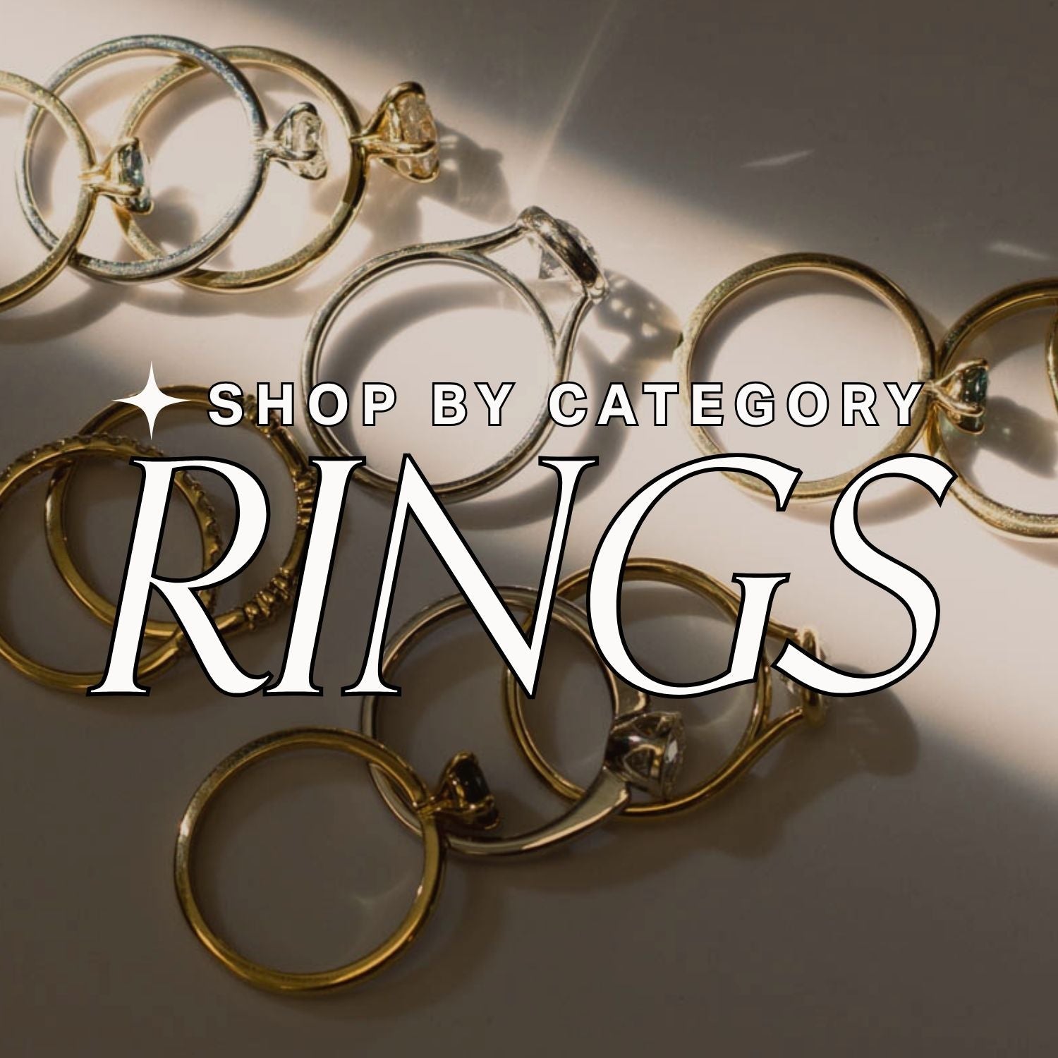 Yellow and White Gold rings with gemstones on a light background, text reads: 'Shop by Category: Rings'.