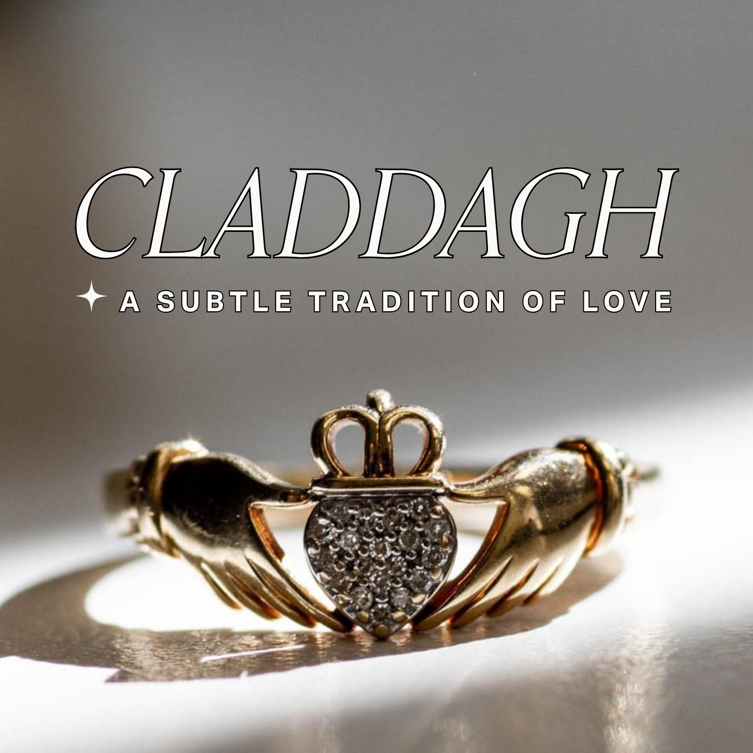 Gold Claddagh ring with pave diamond heart on a shadowy light background, text over reads: 'Claddagh, a subtle tradition of love'.