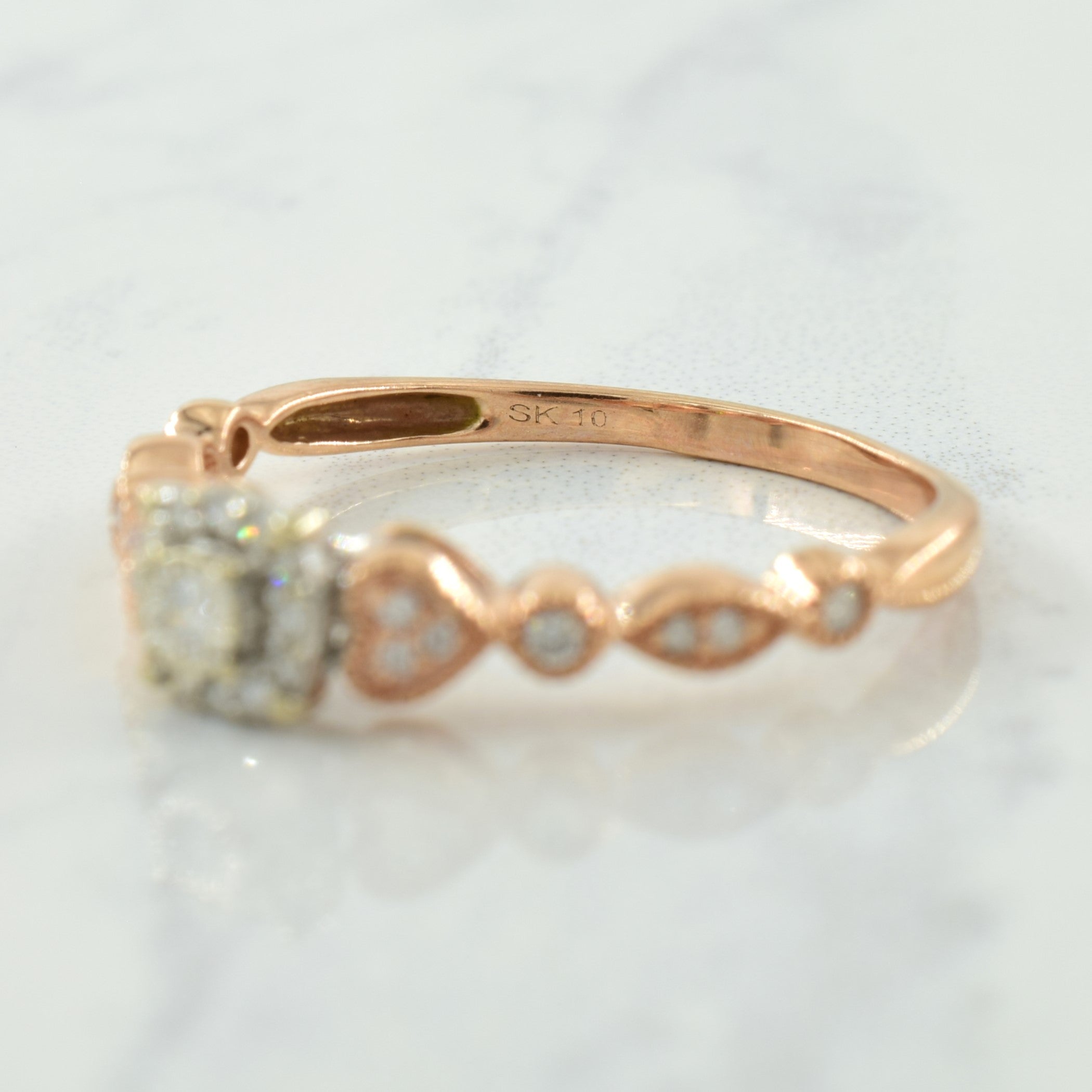 Bague en or rose et blanc sertie de diamants | 0,20 ct | Taille 8,75 |