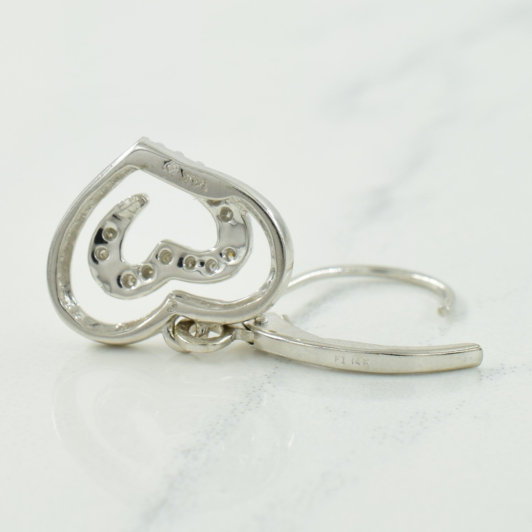 Boucles d'oreilles en forme de cœur serties de diamants | 0,06 ct | 