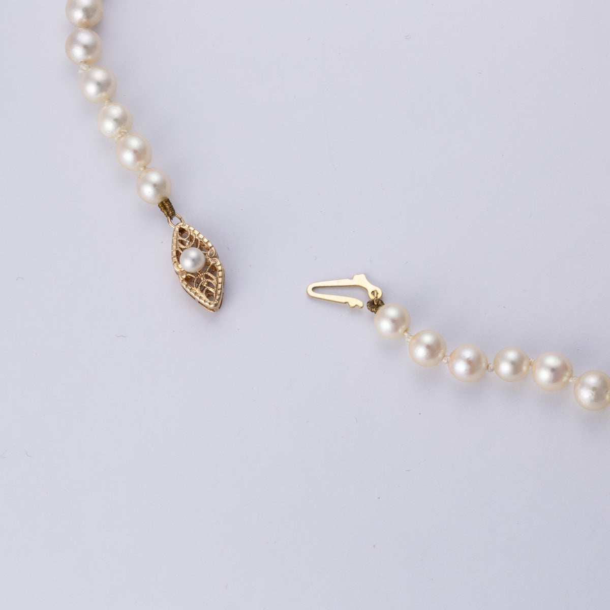 Collier en or jaune 14 carats, perle et diamant | 0,04 ct | 49,5 cm 