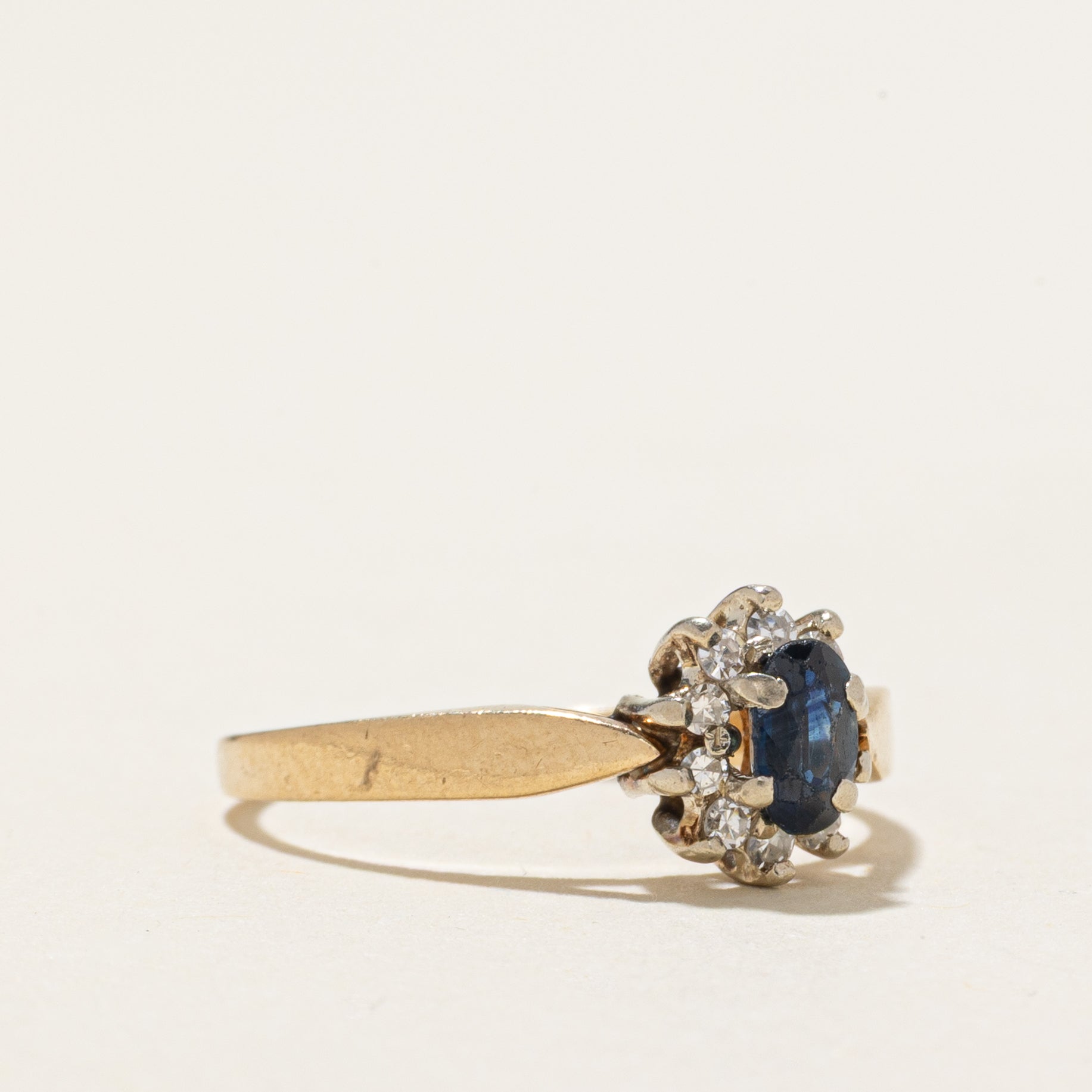 Oval Cut Sapphire & Diamond Petal Halo Ring | SZ 4.75